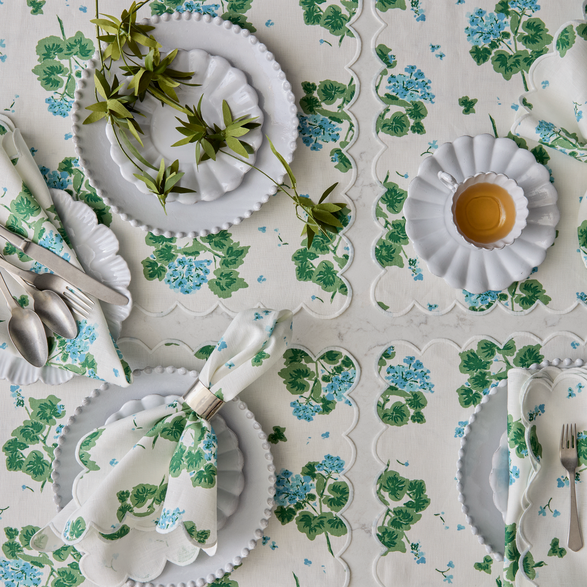 Matouk Tillett Geranium Table Linens in Blue