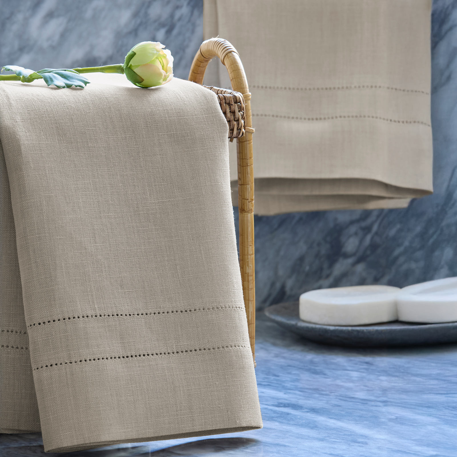 Closeup of Matouk Valentina Hemstitch Guest Towels in Oat