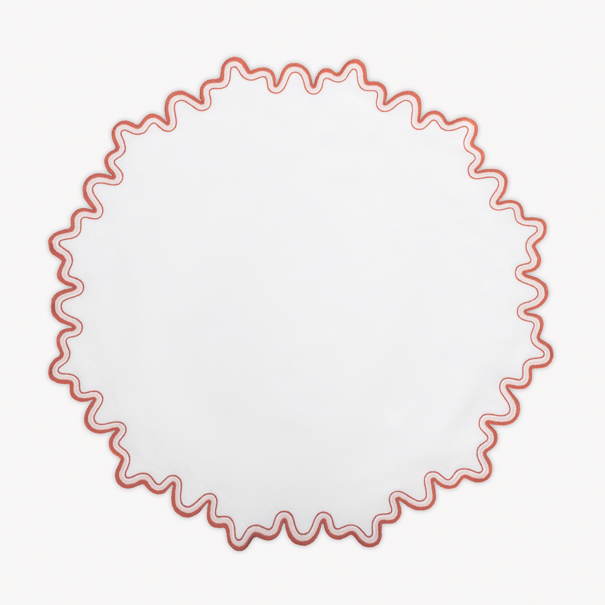 Round Placemat of Matouk Wave Table Linens in Carnelian