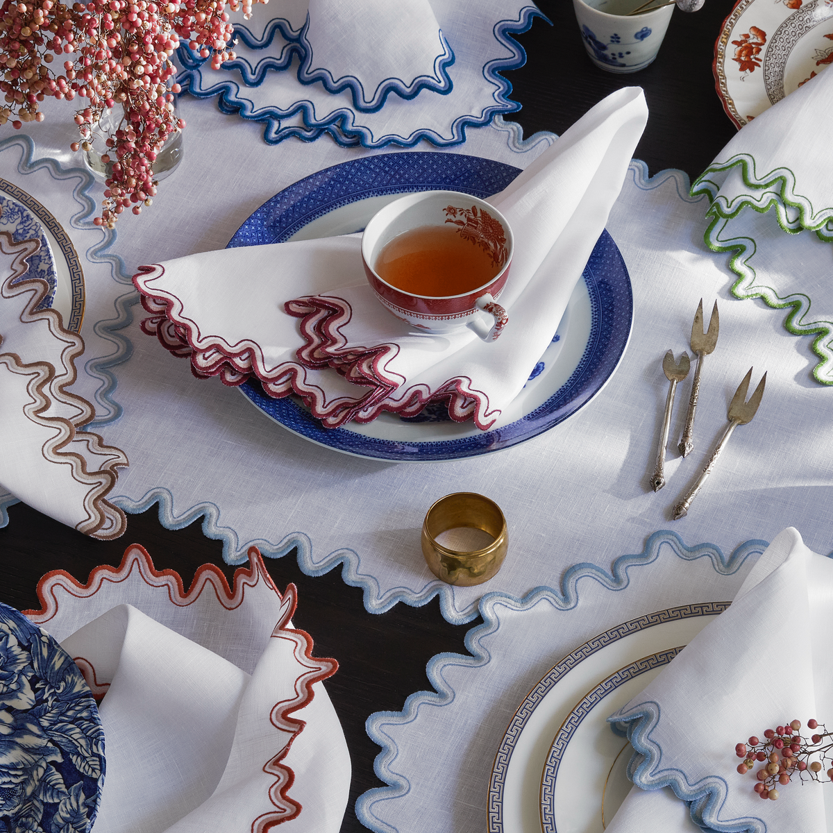 Colors of Matouk Wave Table Linens On Table Setting