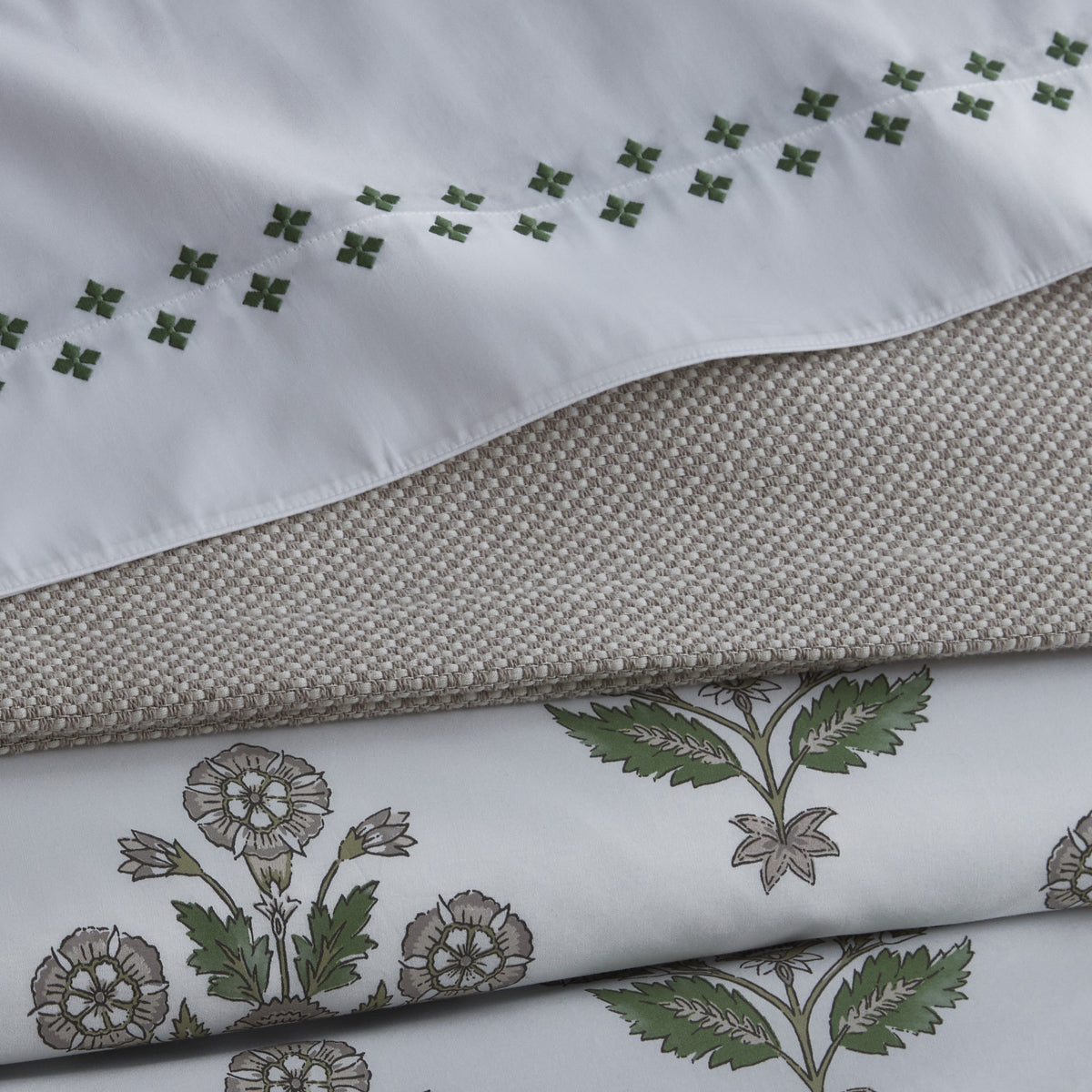 Close-up of Matouk Casablanca, Jackson and Laksha bedding 