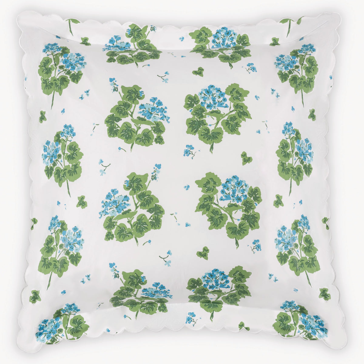 Floral patterned sham with blue and green flowers on a white background