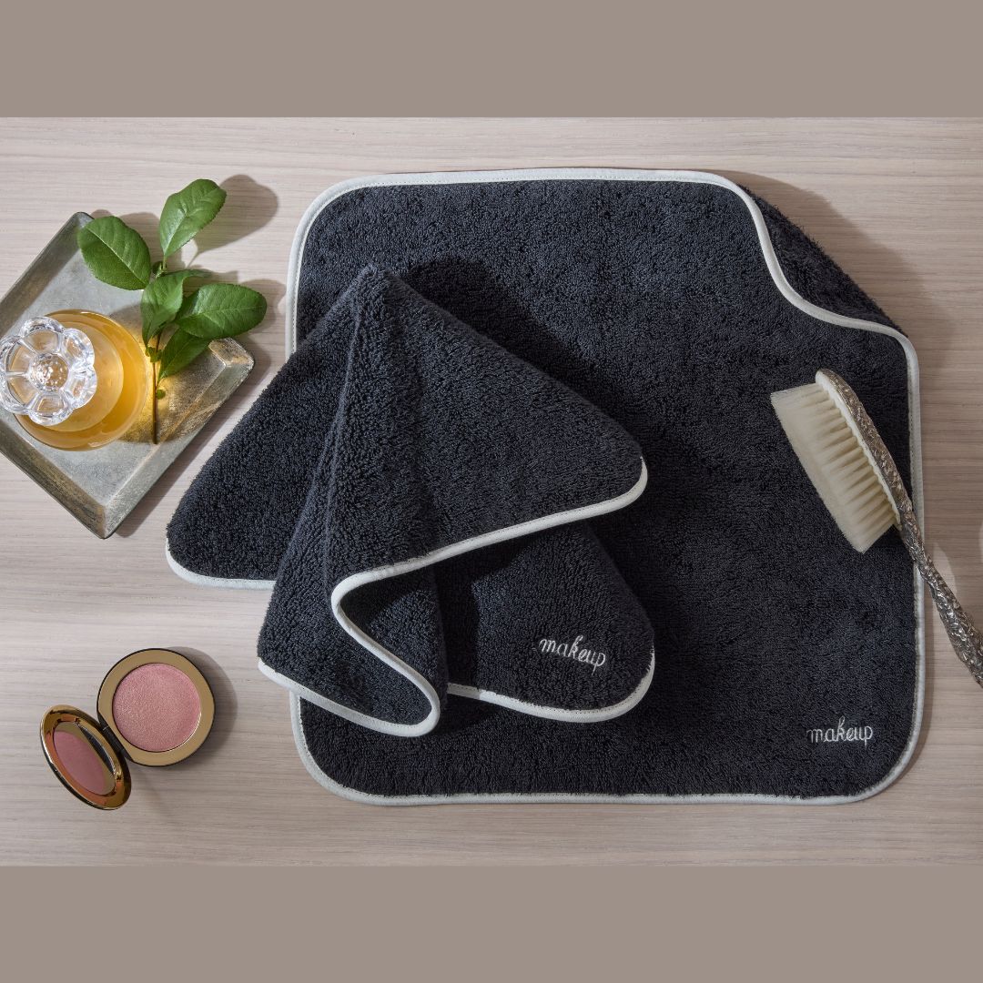 Matouk Giza Makeup Towel image with makeup accessories