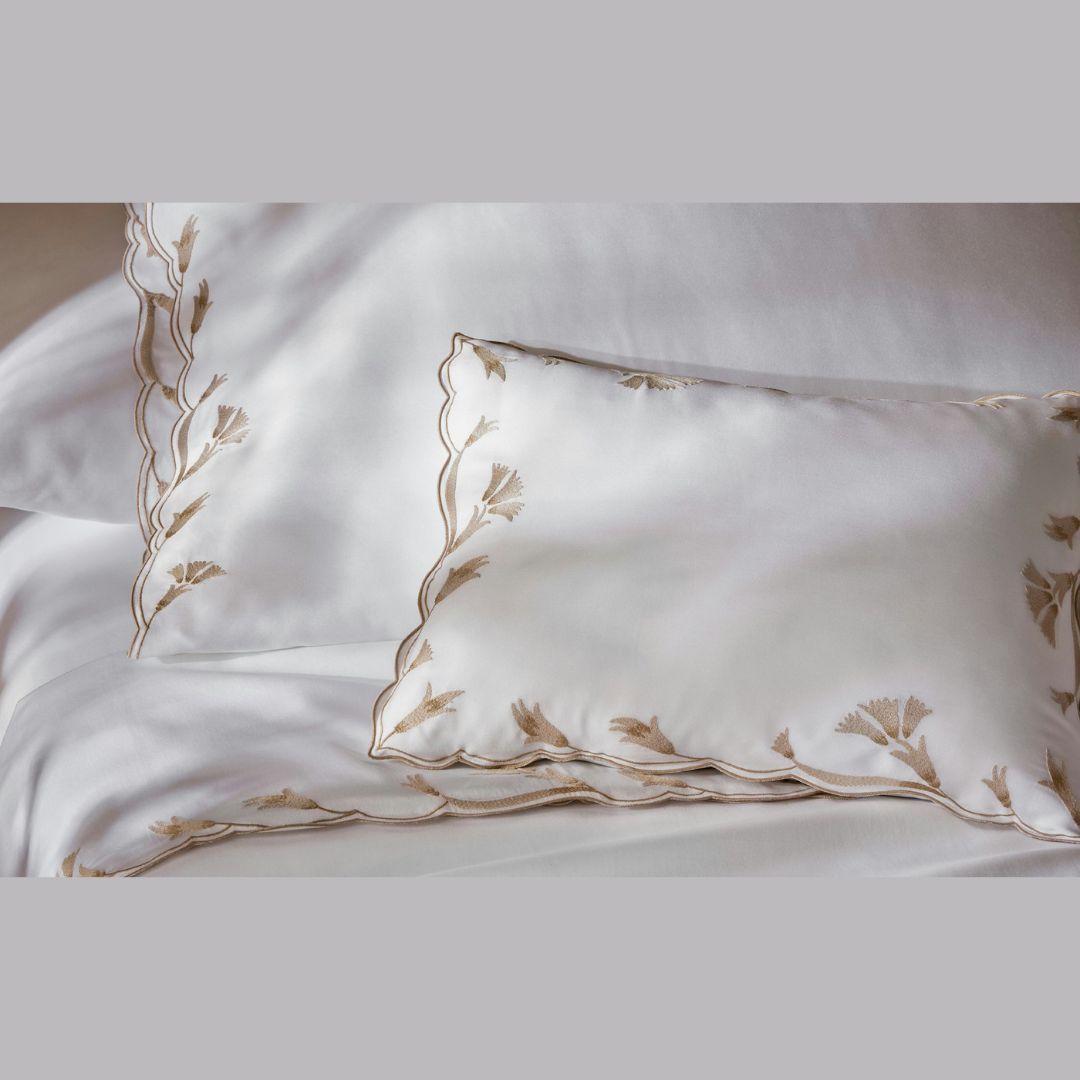 Matouk Marcella sham in Dune on bed