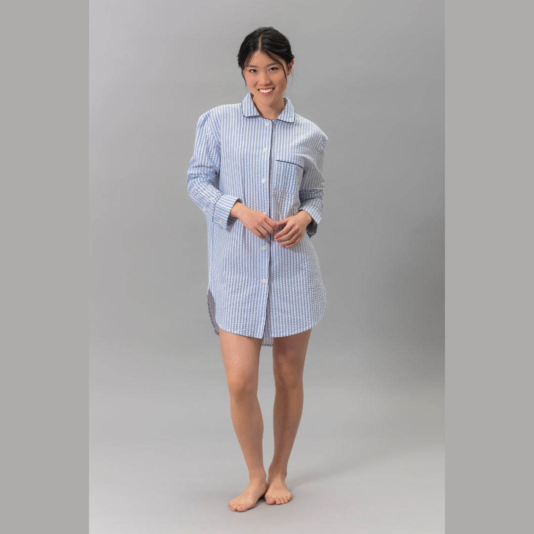 Woman wearing the Matouk Matteo Pajama Shirt in Azure - front view