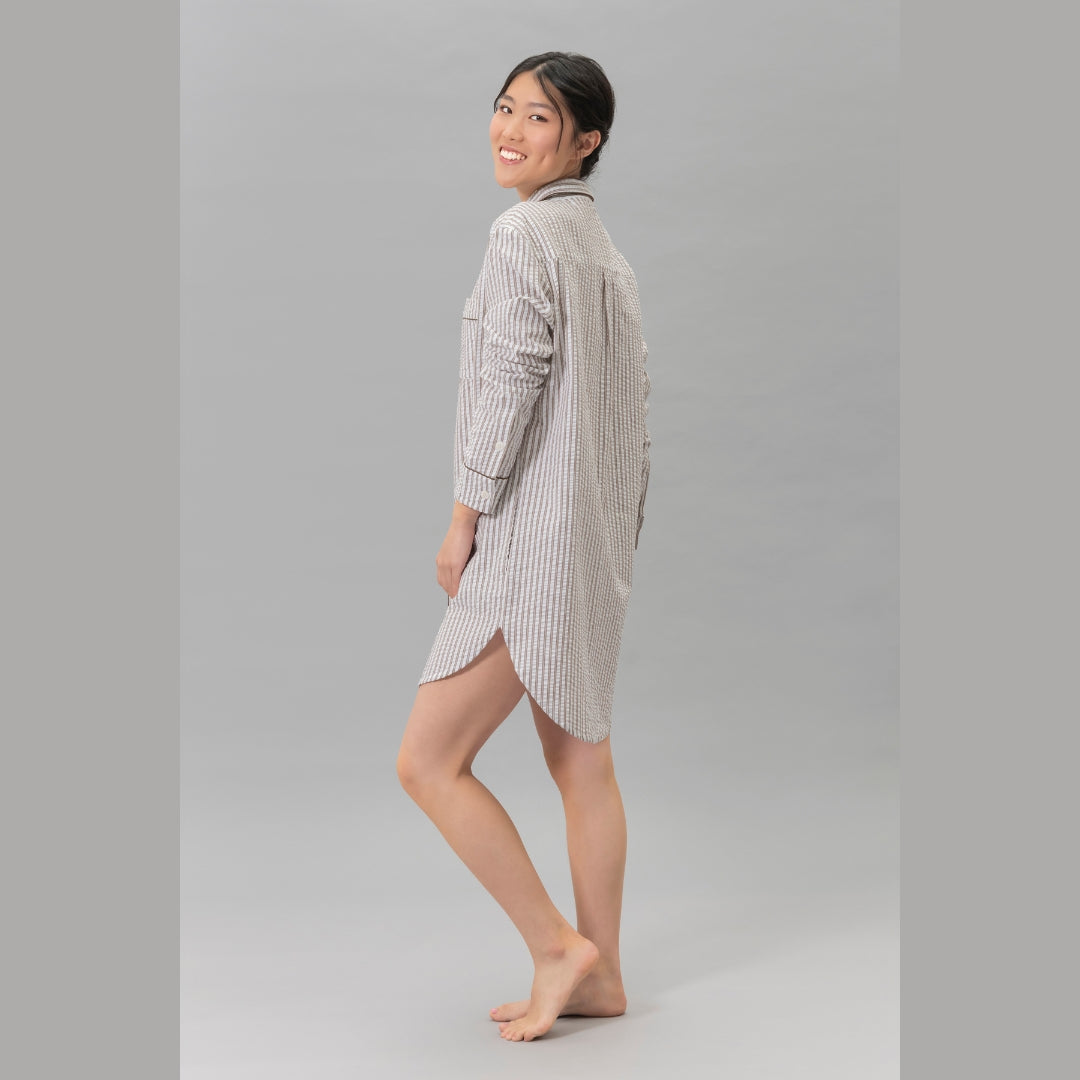 Woman wearing the Matouk Matteo Pajama Shirt in Bark - side view