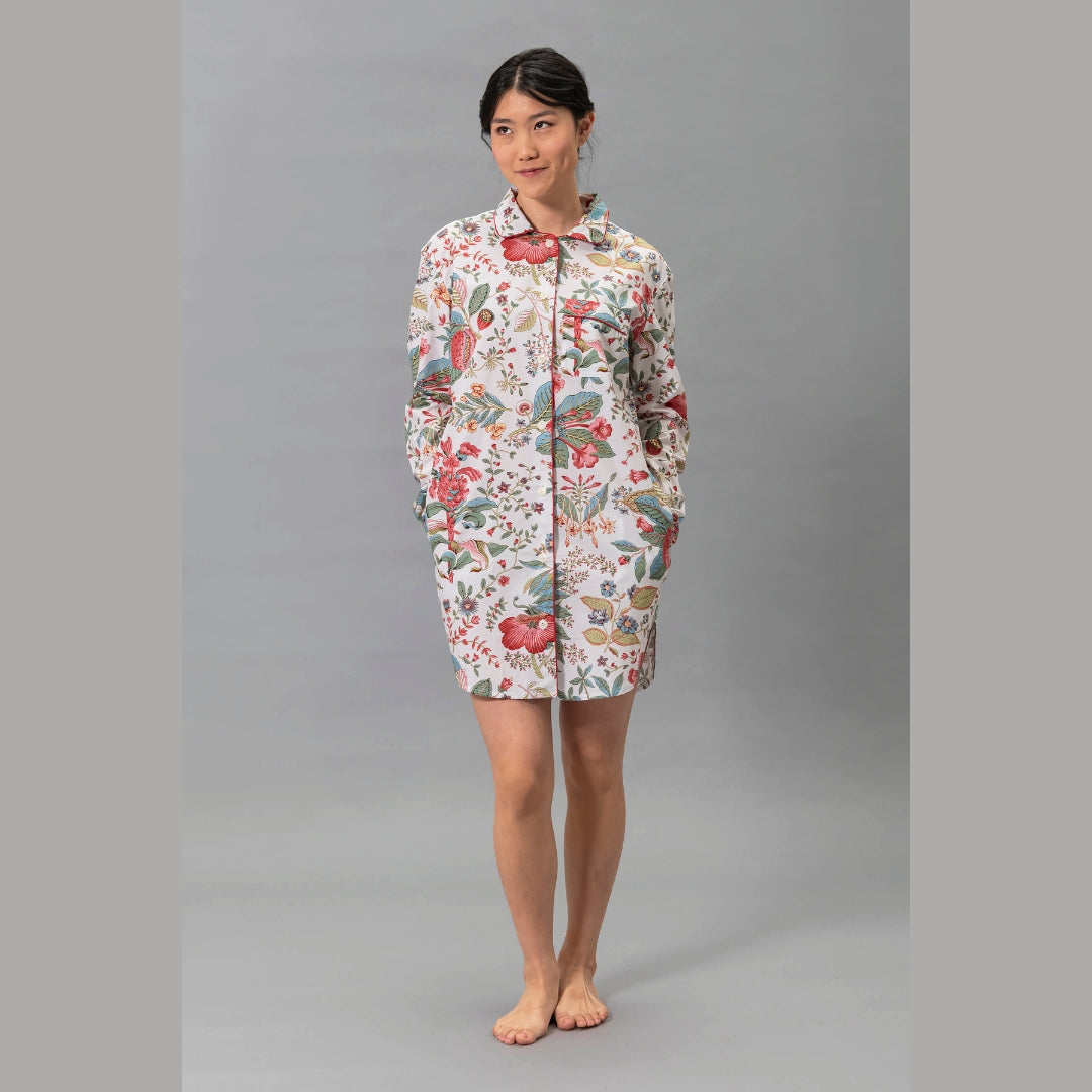 Woman wearing the Matouk Pomegranate Pajama Shirt in Pink Coral - front view