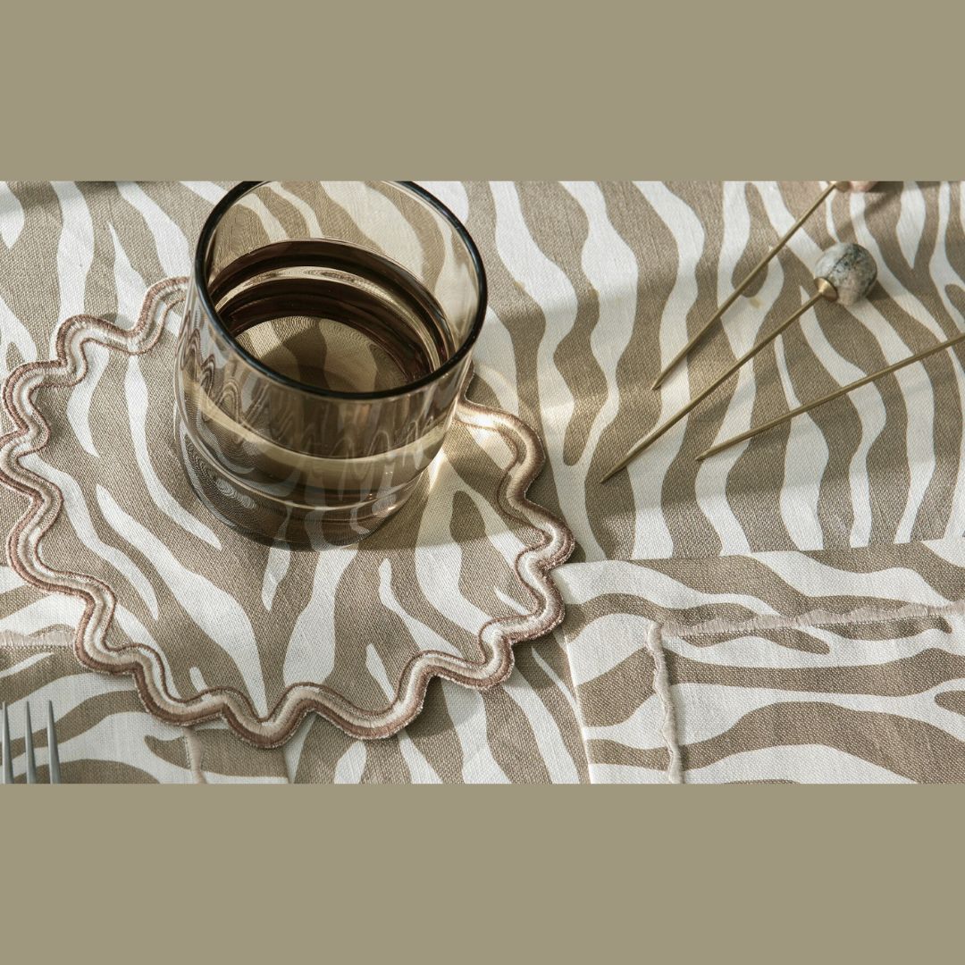 Matouk Schumacher Regine Table Linens in Coconut with a table setting