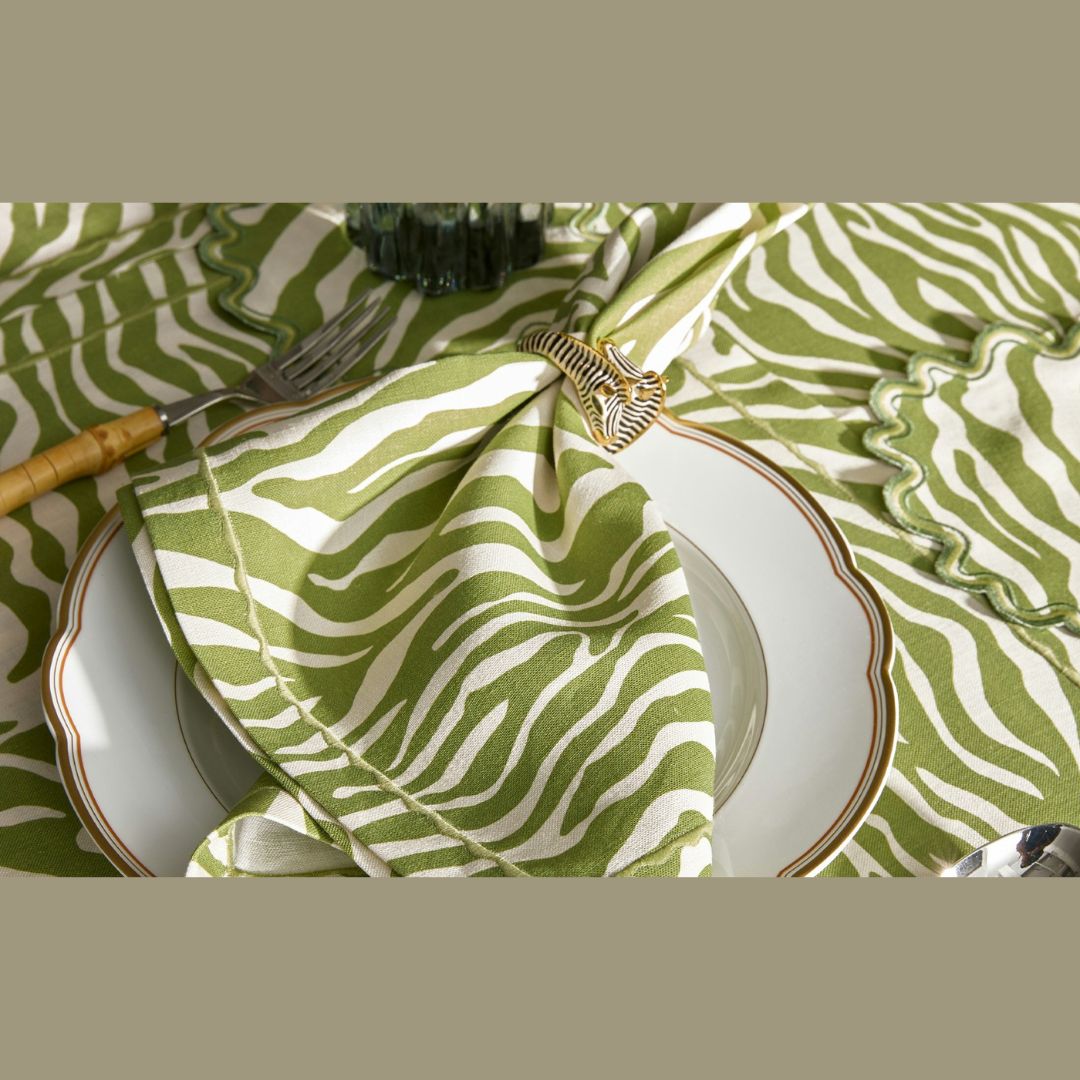 Matouk Schumacher Regine Table Linens in Grass with a table setting