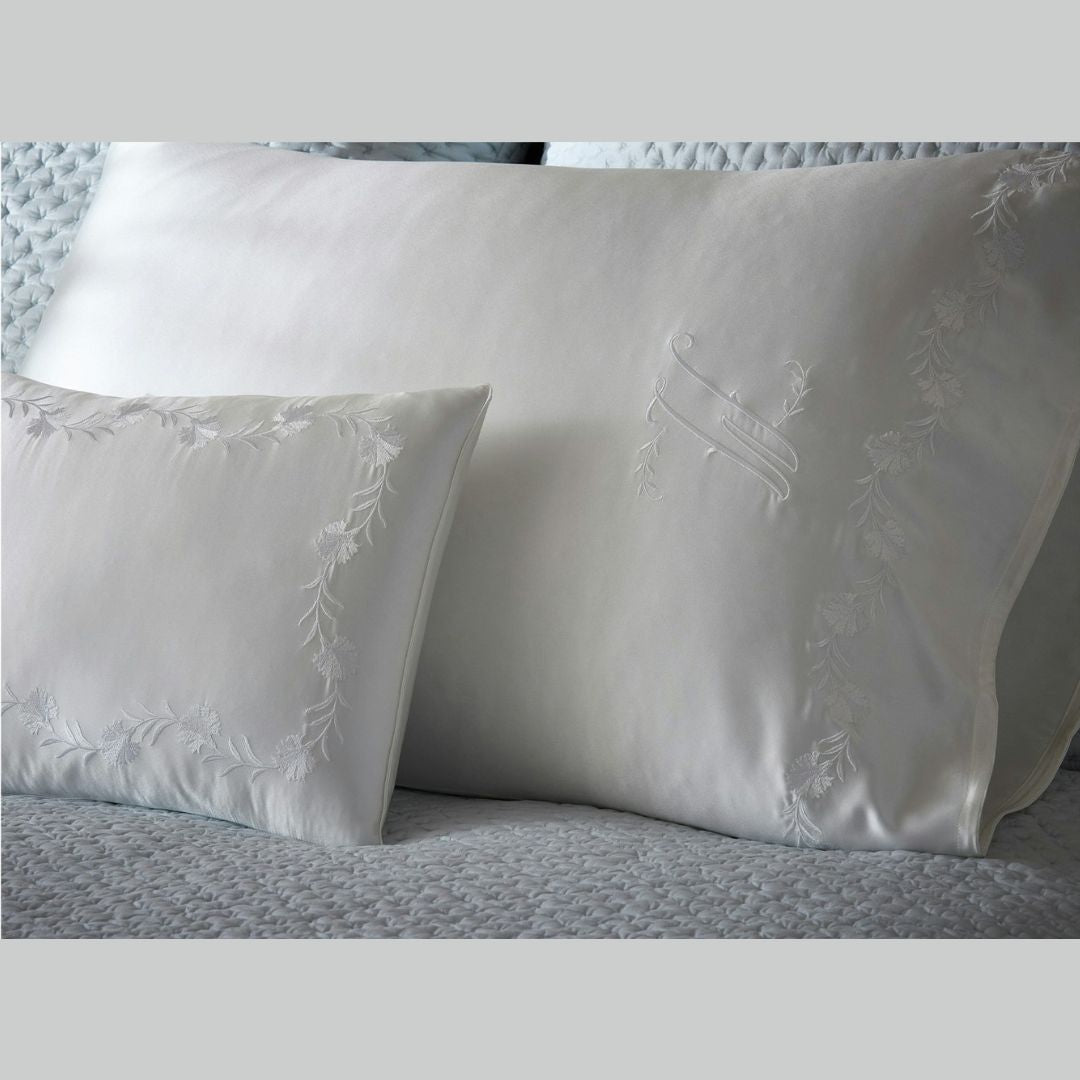 Matouk Silk Collection Daphne lifestyle image, with Margaret in the background