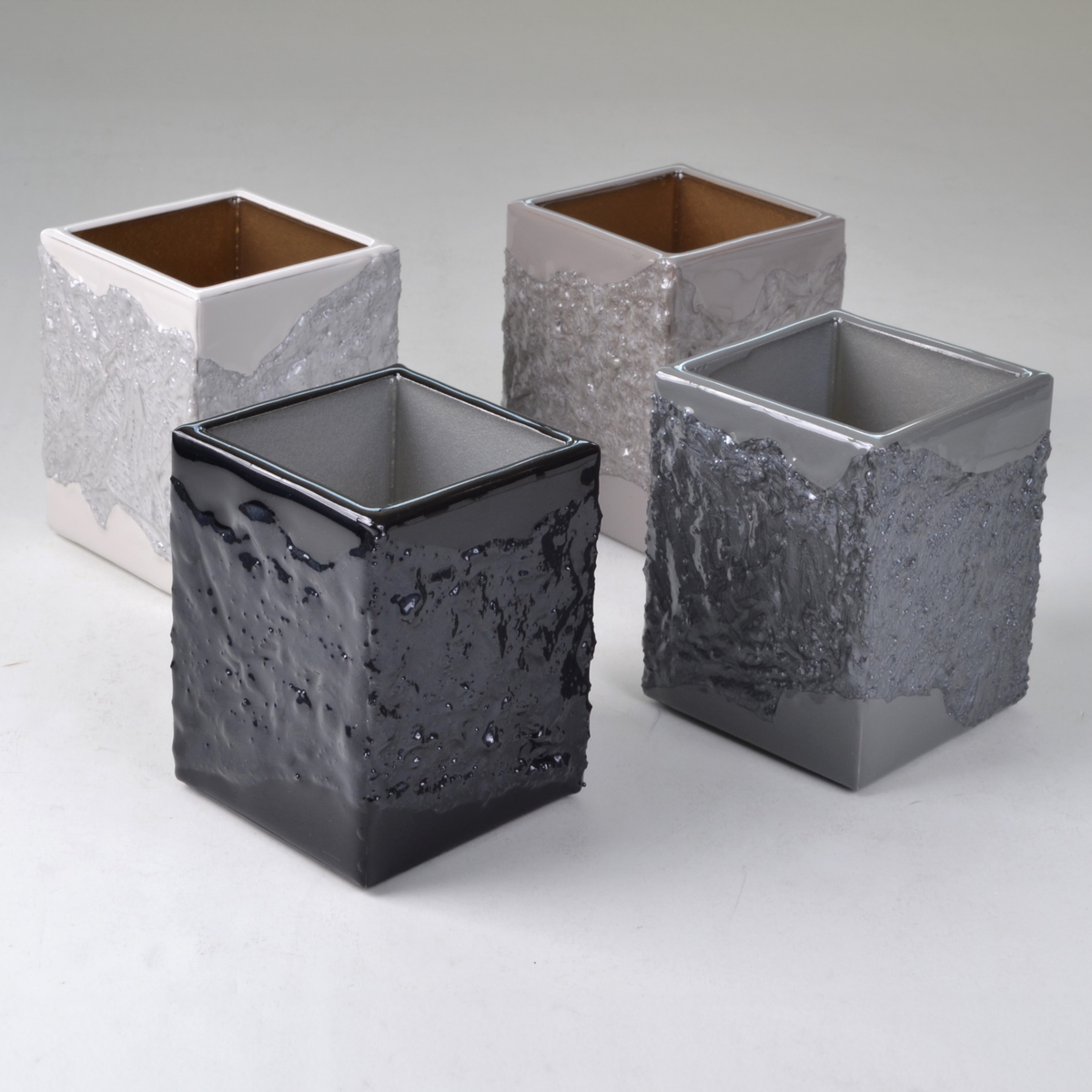 Four Cups of Mike and Ally Brut Bath Accessories in Pearl Black Charcoal and Coffee Colors