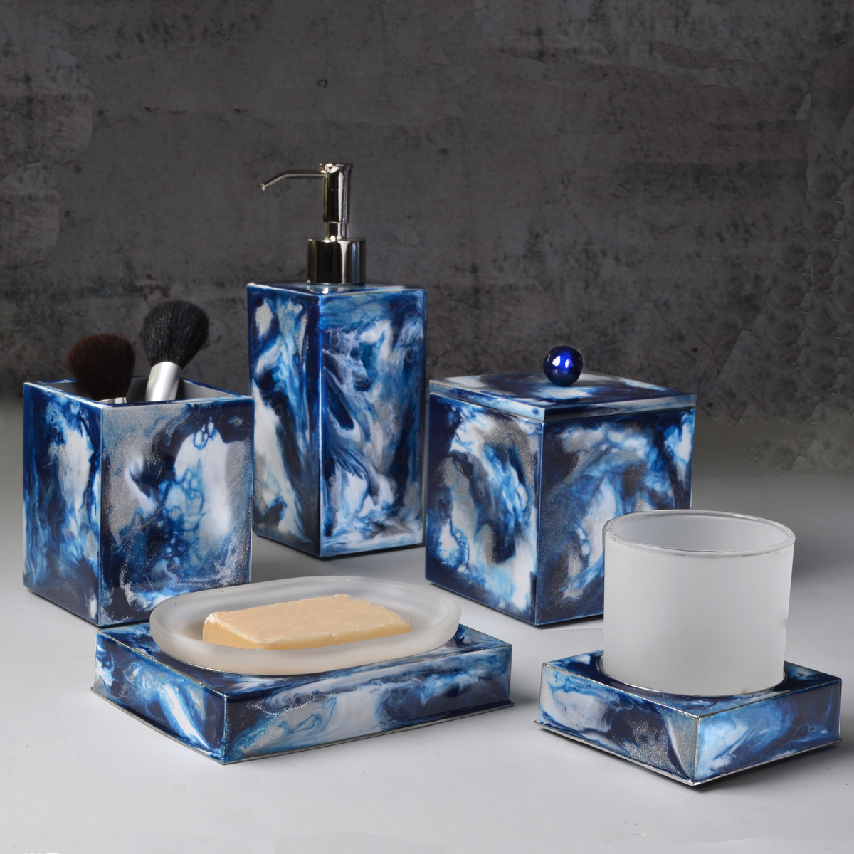 Lifestyle Shot of Mike and Ally Elan Bath Accessories Collectioin in Blue Medley Silver Color