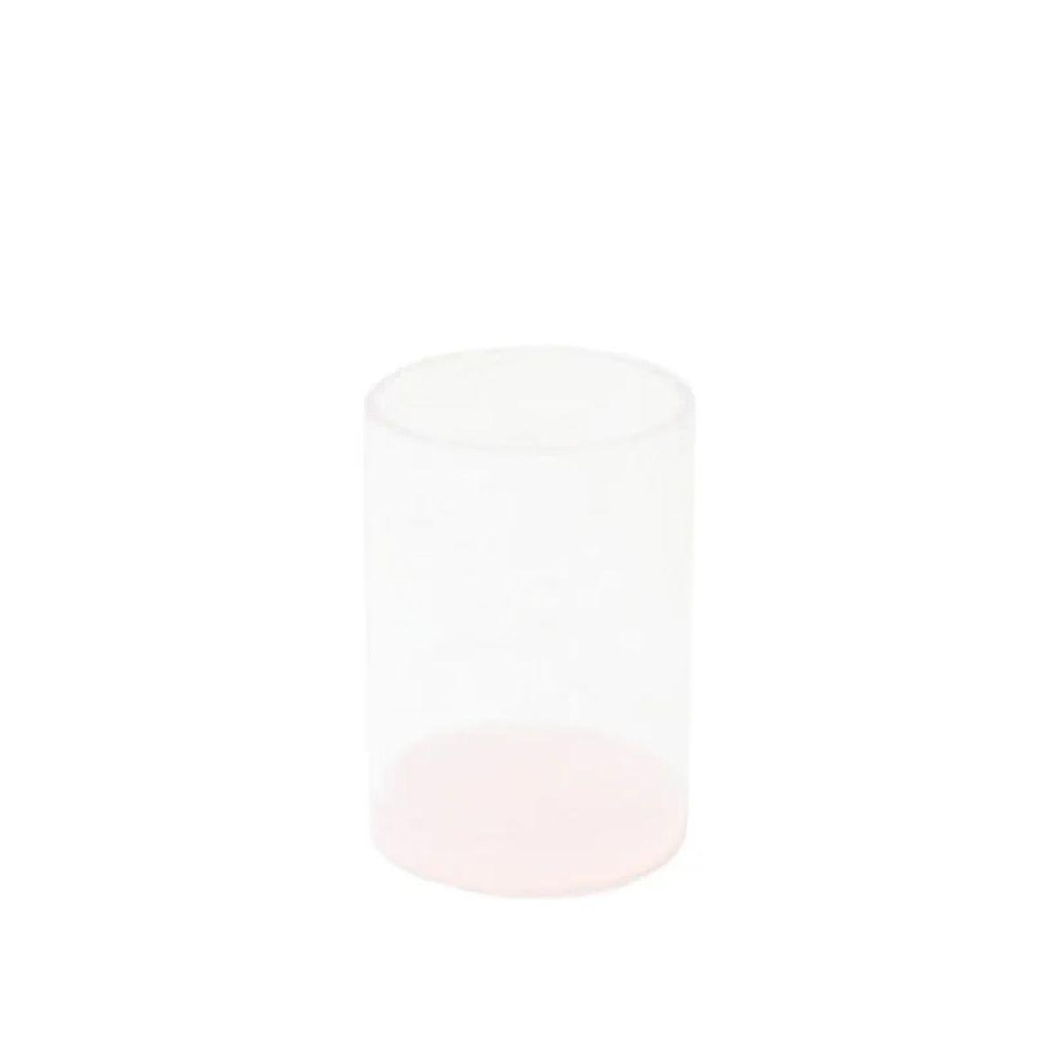 A clear drinking glass with a faint pink tint, part of our lucite collection, shown against a white background.