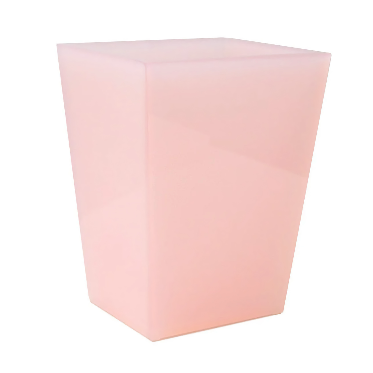 A pink, translucent lucite bath accessory waste bin with a tapered shape, set against a white background.