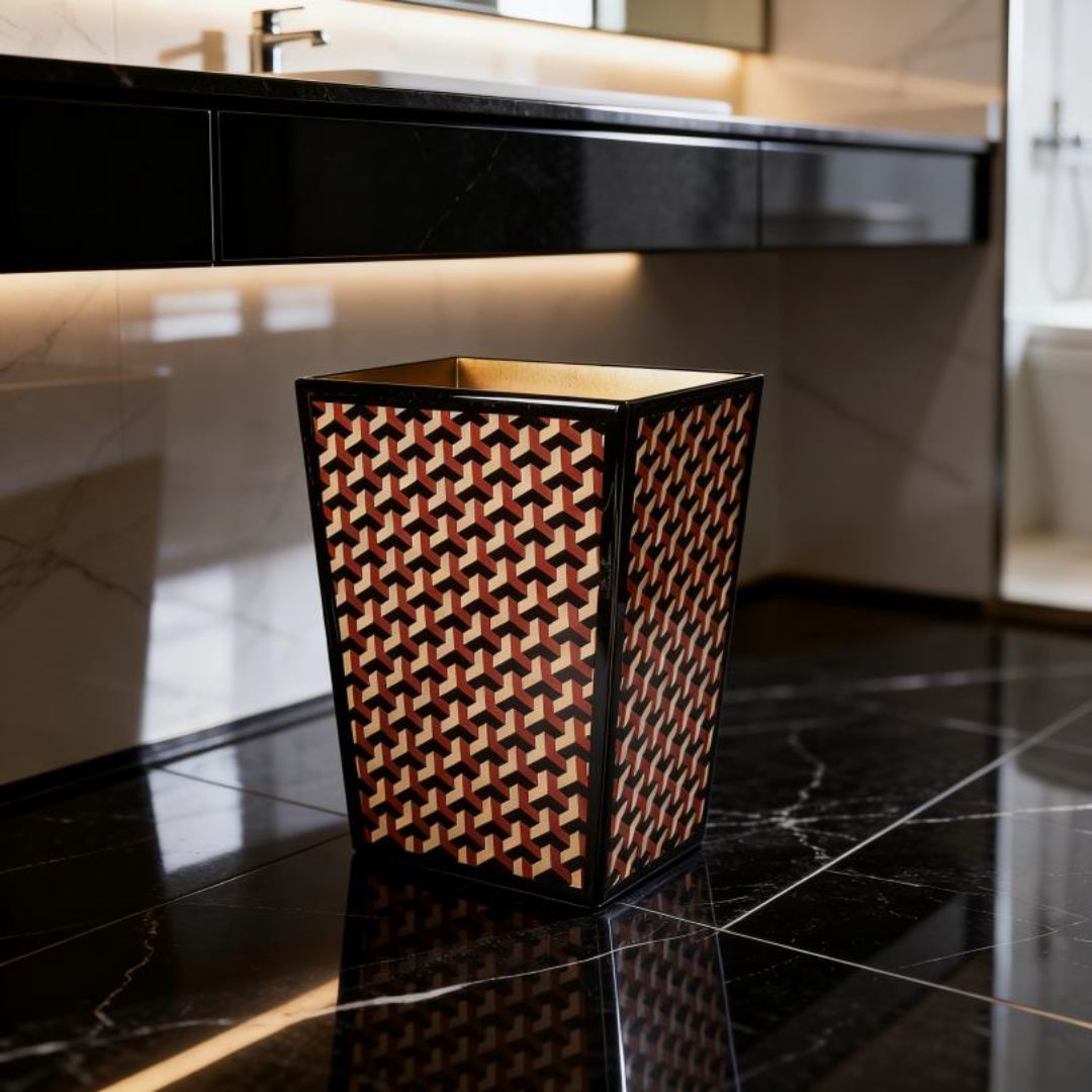 Geo wastebasket shown in a bathroom with a black marble floor next to a sink