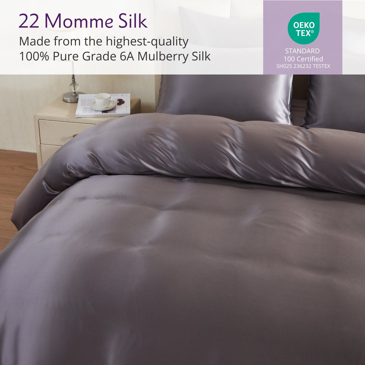 Gray silk bedding set with '22 Momme Silk' text and Oeko-Tex certification label.