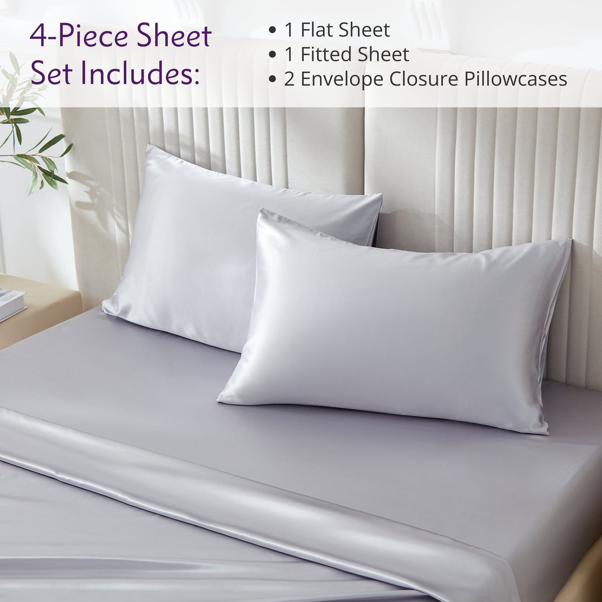 Elegant bed setup featuring a 4-piece sheet set, complete with matching pillows and silk bed sheets