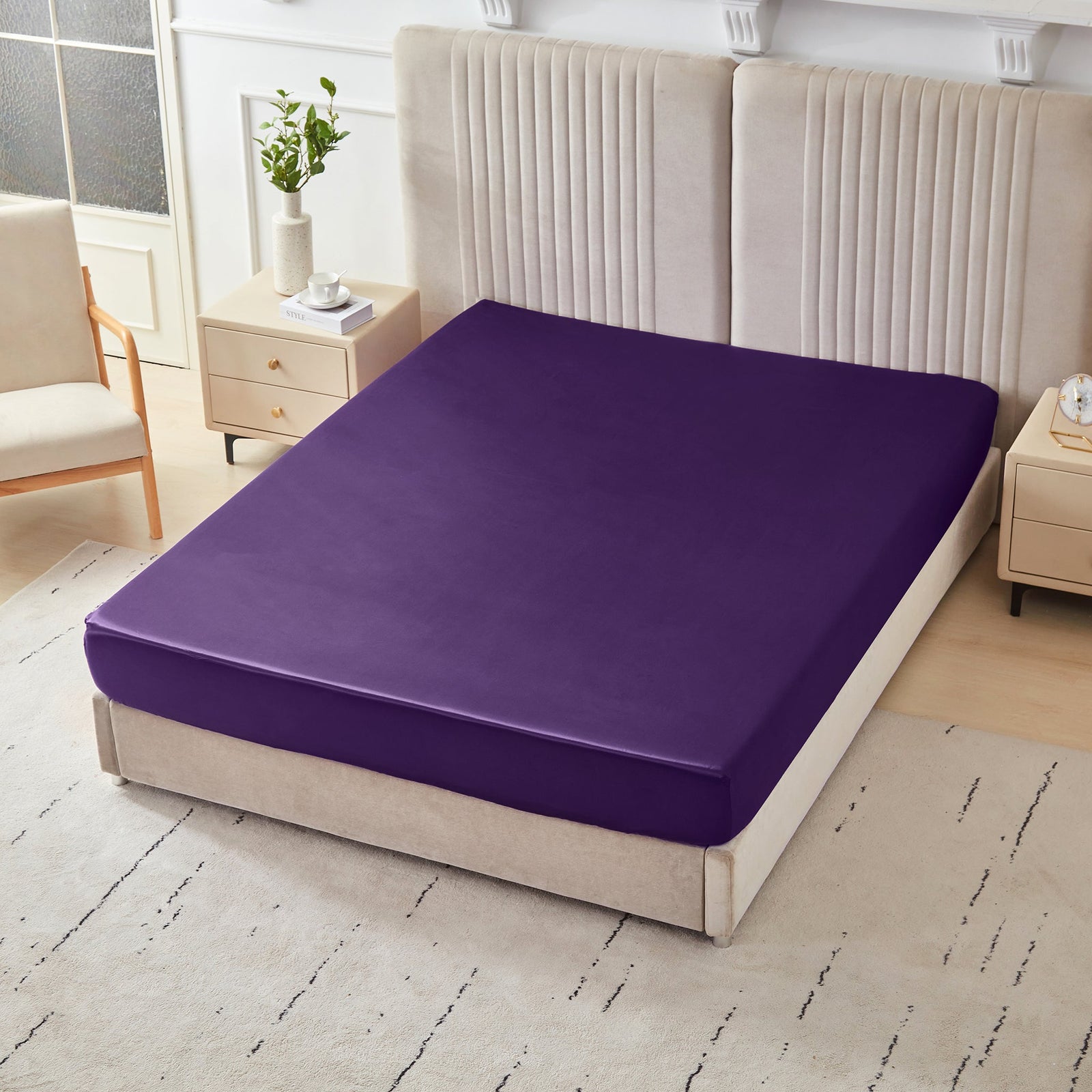 Mulberry Park Silks 22 Momme Silk Fitted Sheets in Plum on bed with upholstered headboard in a cozy bedroom setting