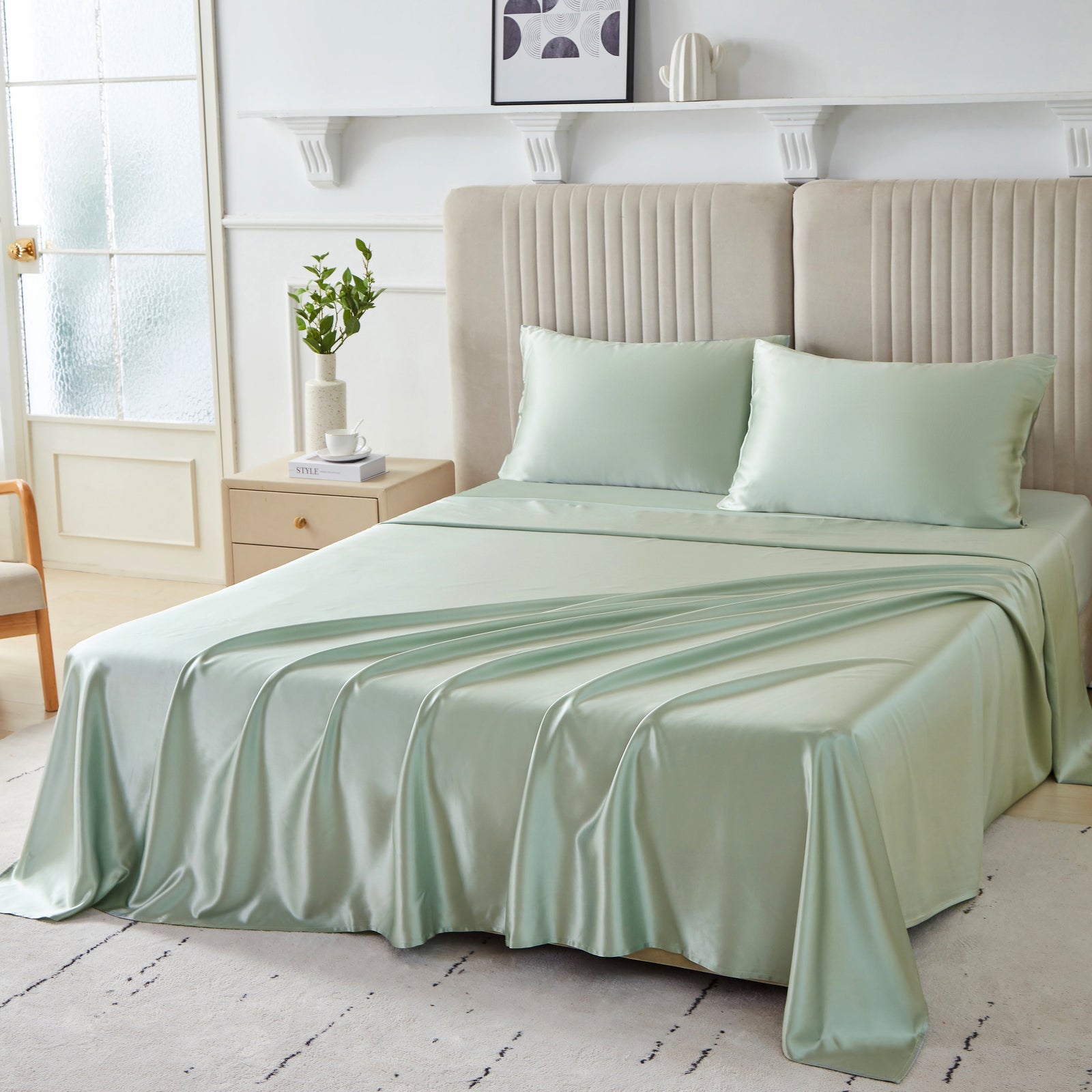 Elegant 22 Momme Silk Sheets Set in Sage color displayed on a beautiful bed with 2 silk pillows