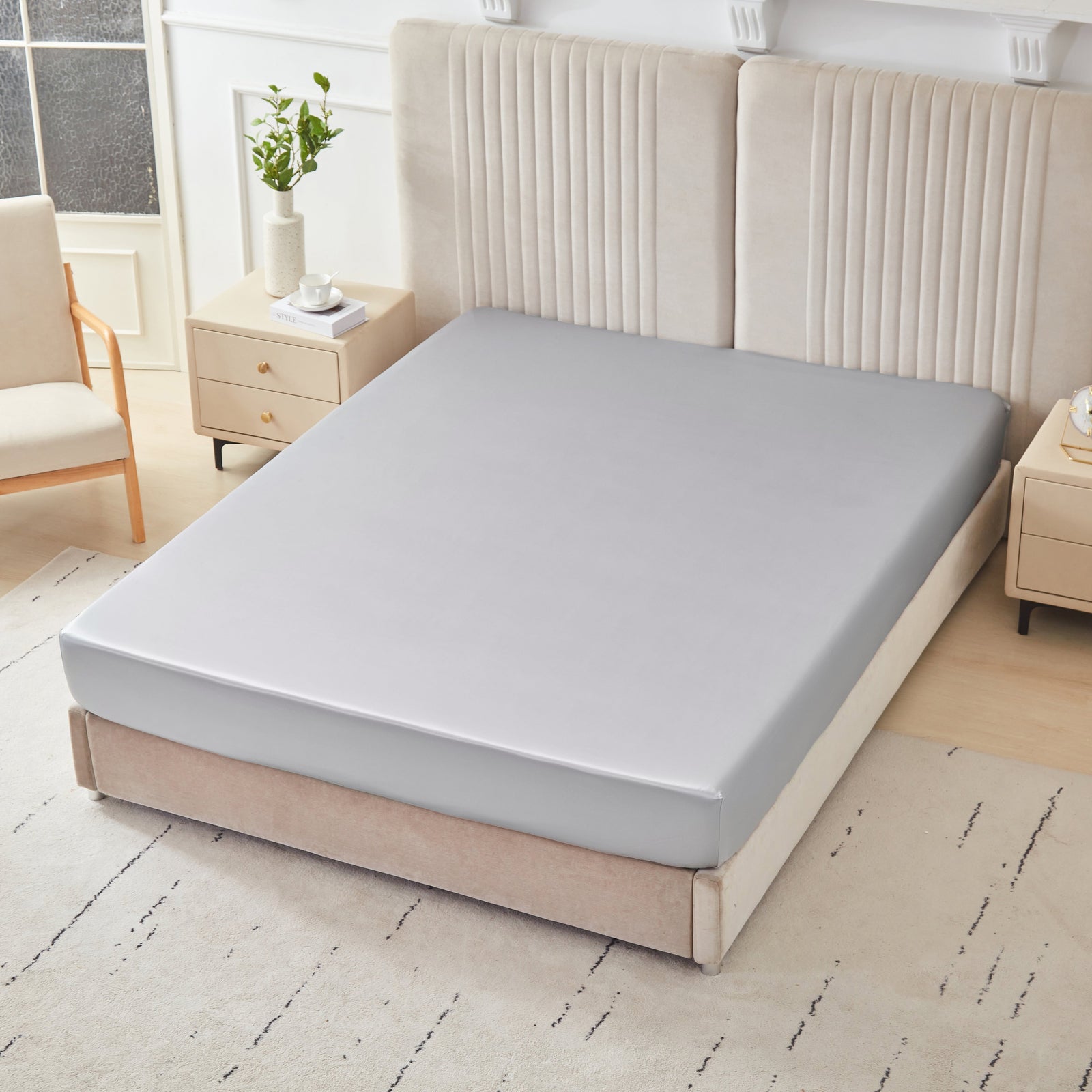 Mulberry Park Silks 22 Momme Silk Fitted Sheets in Gunmetal on bed with upholstered headboard in a cozy bedroom setting