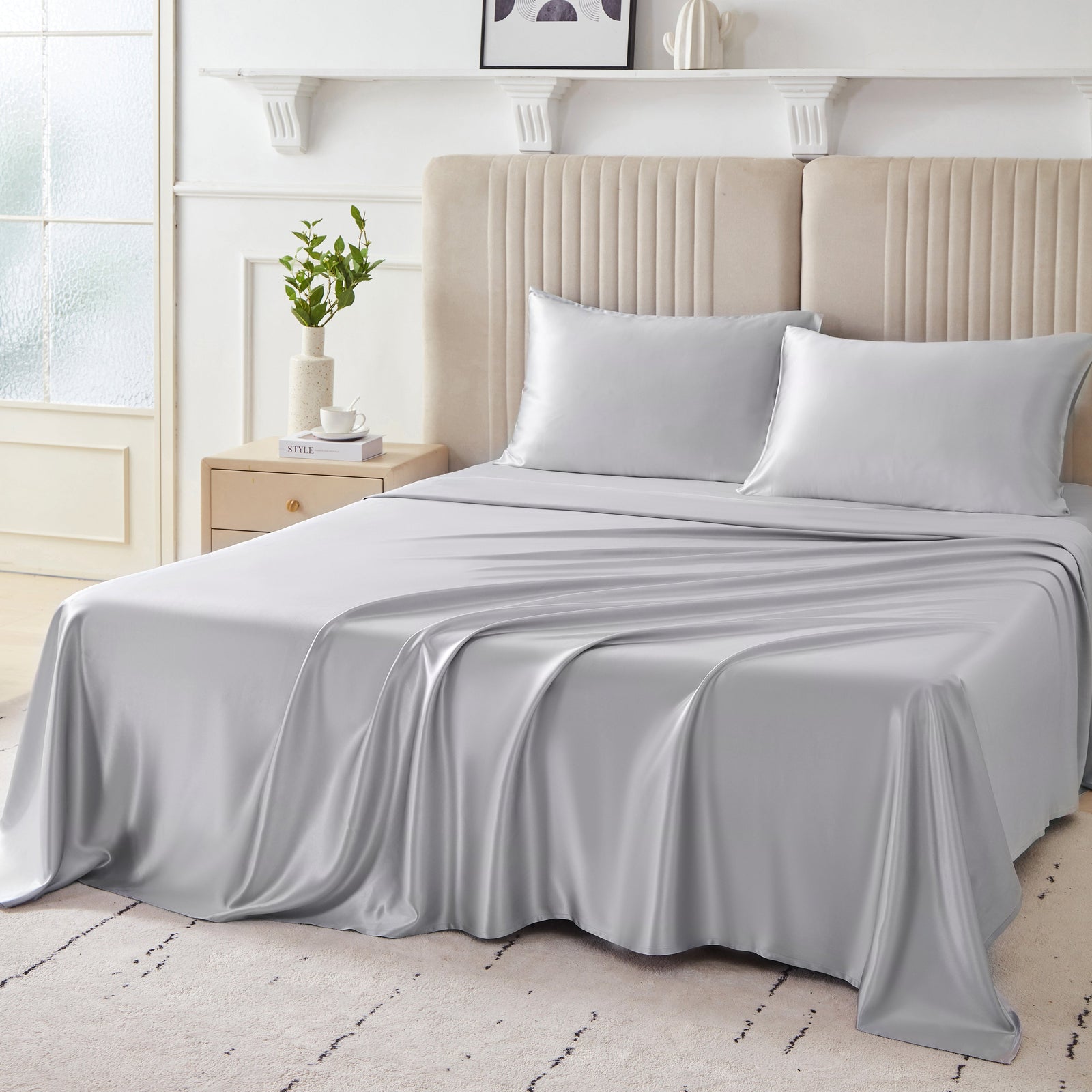 Elegant 22 Momme Silk Sheets Set in Silver color displayed on a beautiful bed with silk pillows