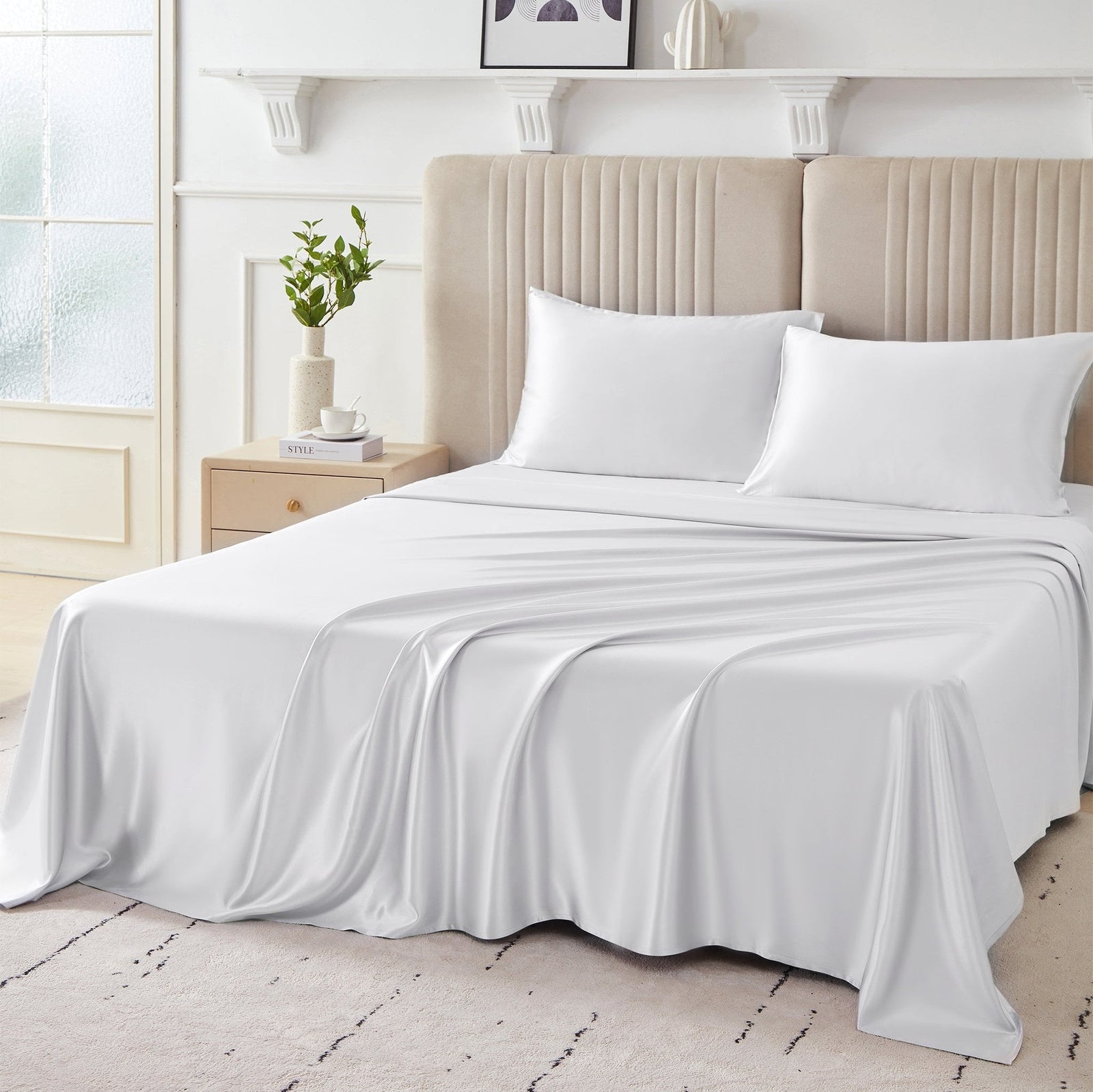 Elegant 22 Momme Silk Sheets Set in White color displayed on a beautiful bed with silk pillows