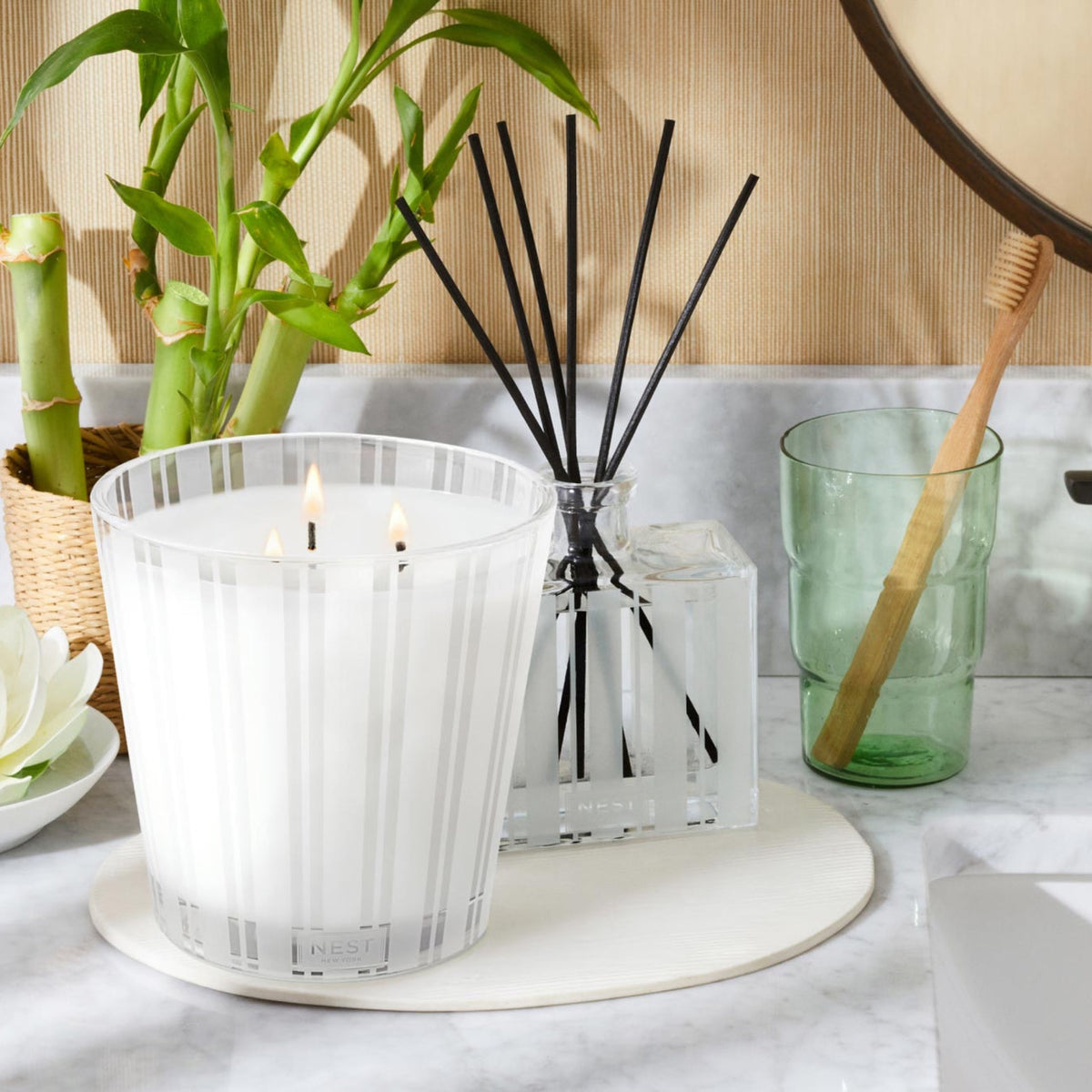 Lifestyle Photo of Nest New York’s Bamboo 3-Wick Candle with Reed Diffuser