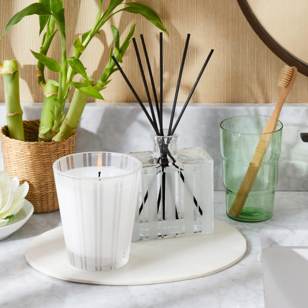 Nest New York Bamboo Reed Diffuser Lifestyle With Candle
