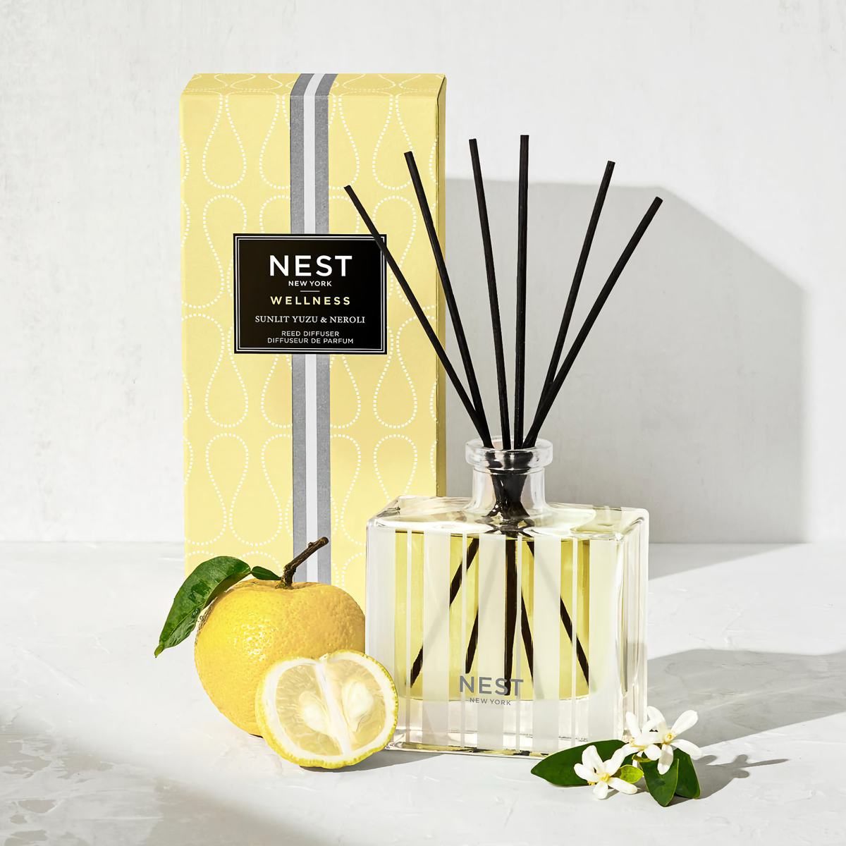 Lifestyle Image of Nest New York Sunlit Yuzu and Neroli Reed Diffuser with Box