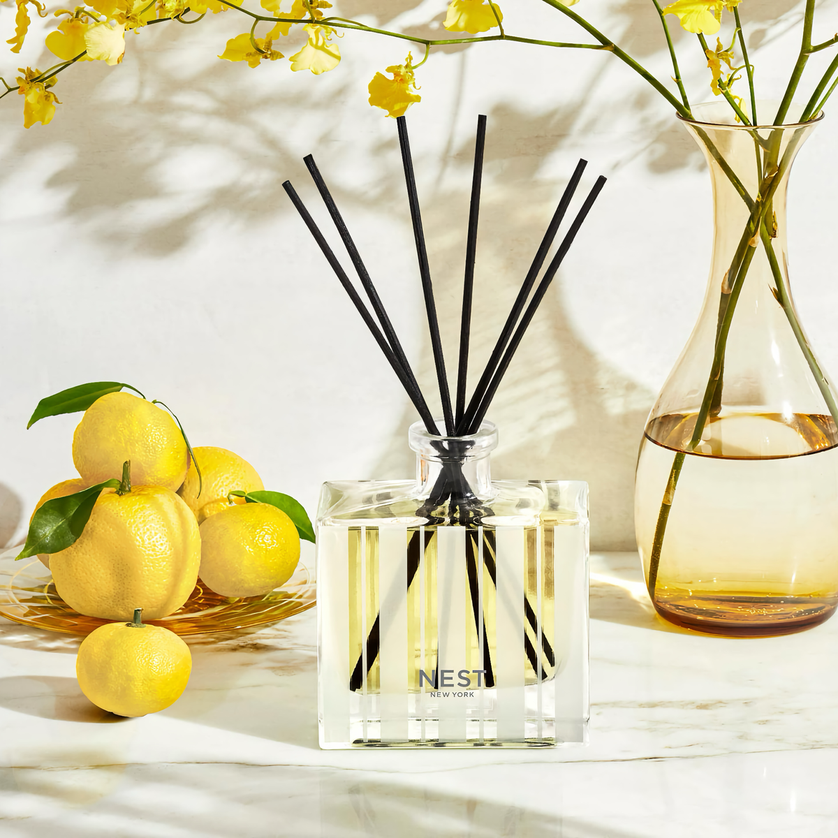 Nest New York Sunlit Yuzu and Neroli Reed Diffuser with Real Yuzu Fruit