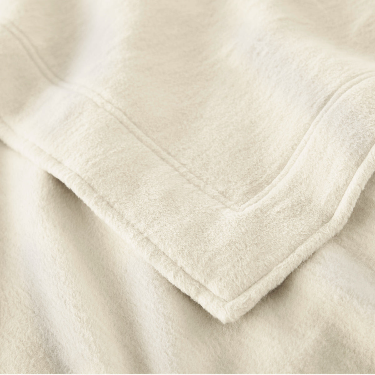 Detailed View of Peacock Alley All Seasons Framed Blanket in Natural color