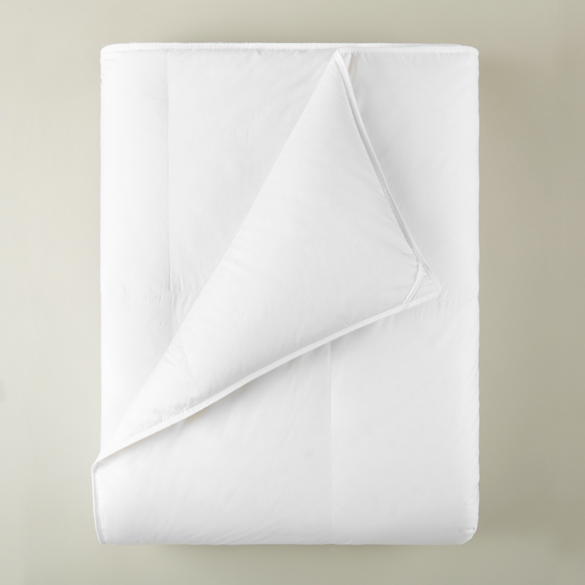 Overheard View of Folded Peacock Alley Canadian White Down 850 Fill Power Duvet Inserts