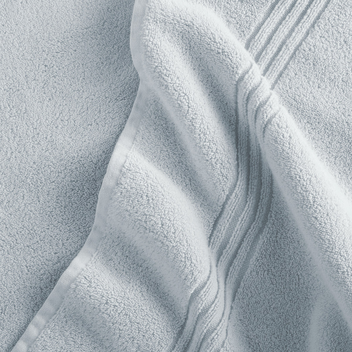 Close-up of Peacock Alley Chelsea Bath Towel in Mist color