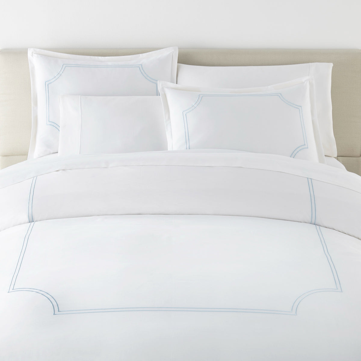 Front View of Bed in Sky color Peacock Alley Deco Classic Embroidered Duvet Set