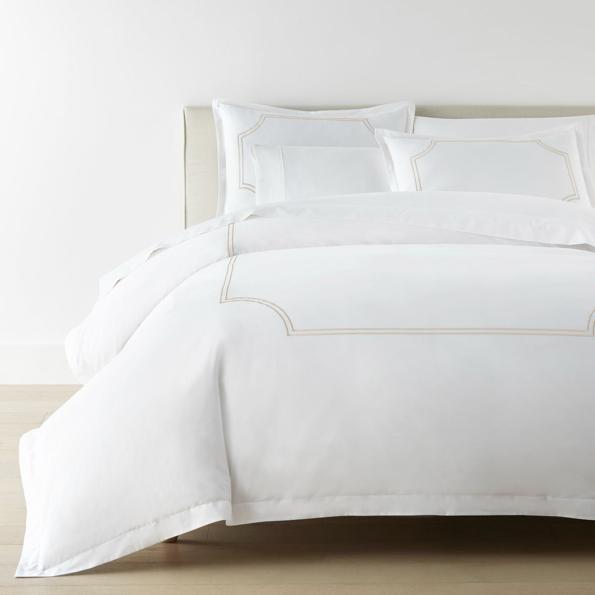 Corner View of Bed in Linen color Peacock Alley Deco Classic Embroidered Duvet Set