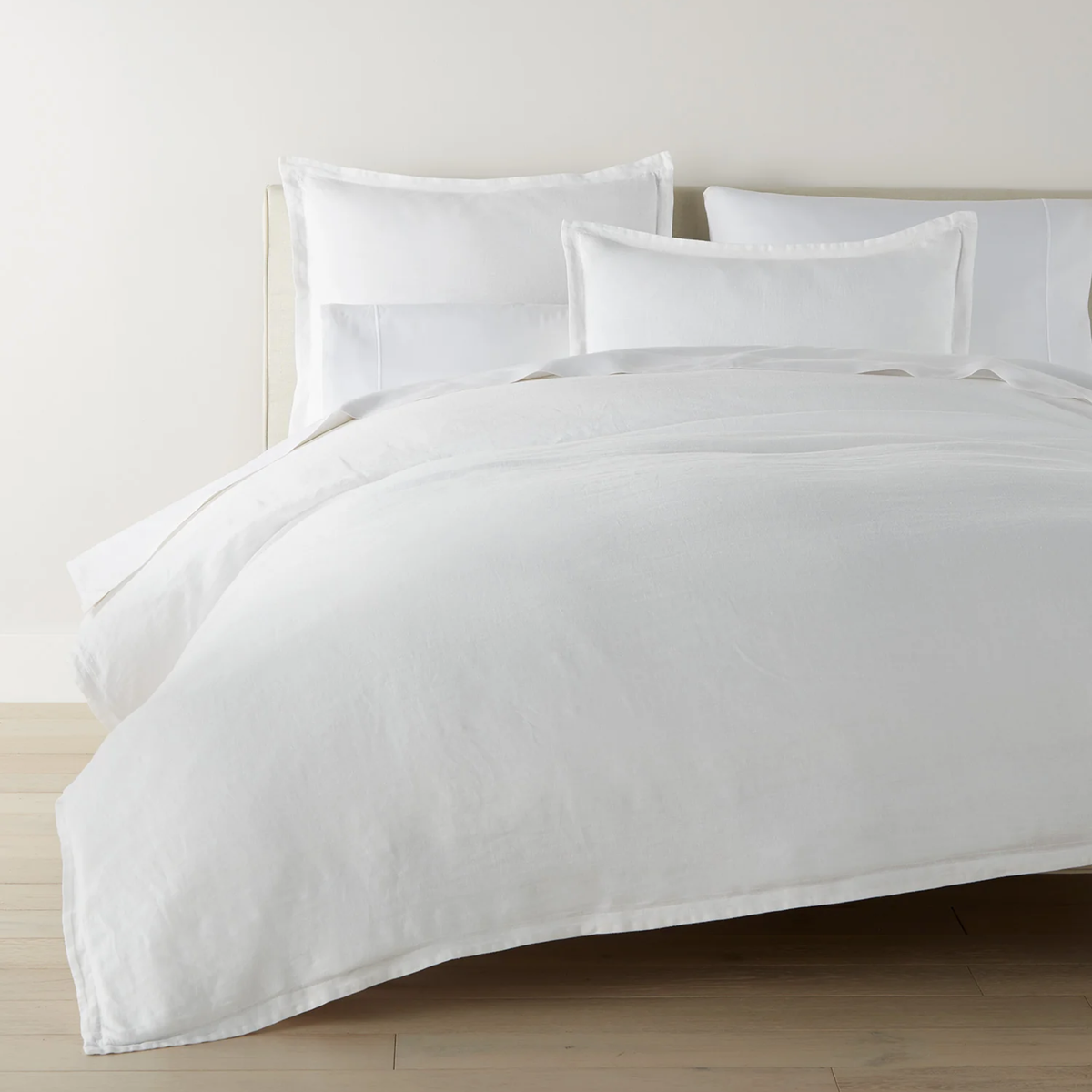 Full Bed Dressed in Peacock Alley European Washed Linen Bedding in White Color