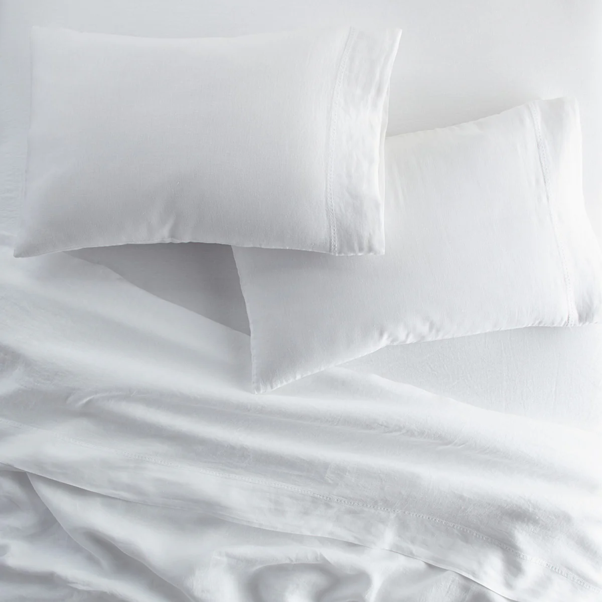 Pair of Pillowcases of Peacock Alley European Washed Linen Bedding in White Color
