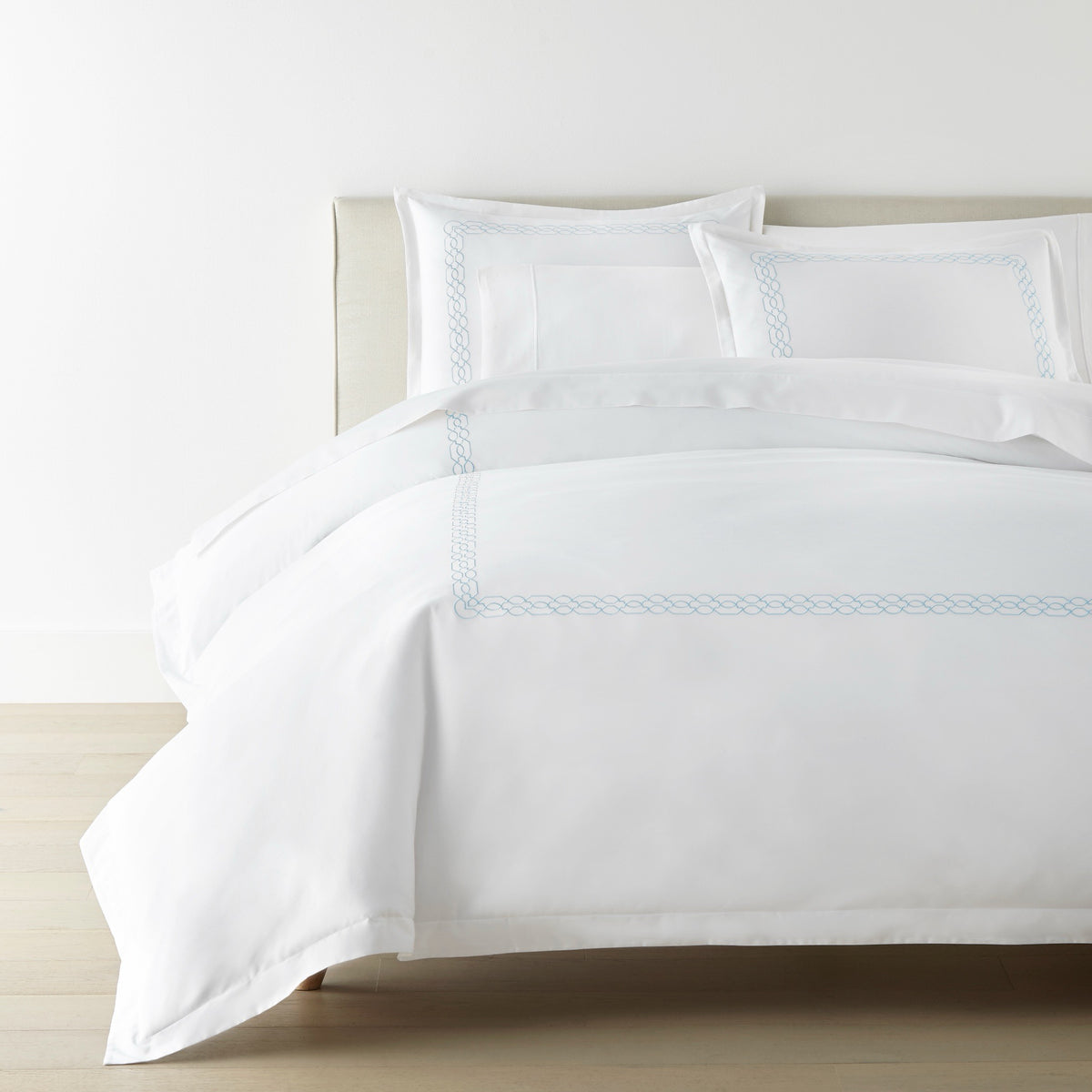 Corner View of Bed in Sky Peacock Alley Filigree Classic Embroidered Duvet Set