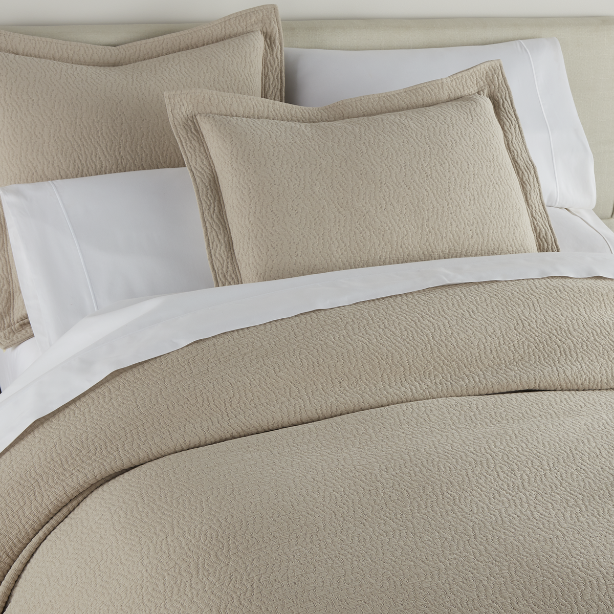 Close Up Image of Peacock Alley Mia Stonewashed Matelassé Bedding in Color Dune