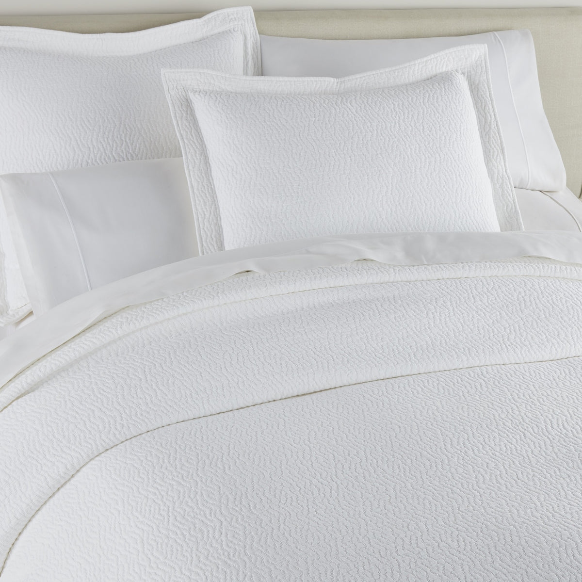 Close Up Image of Peacock Alley Mia Stonewashed Matelassé Bedding in Color White
