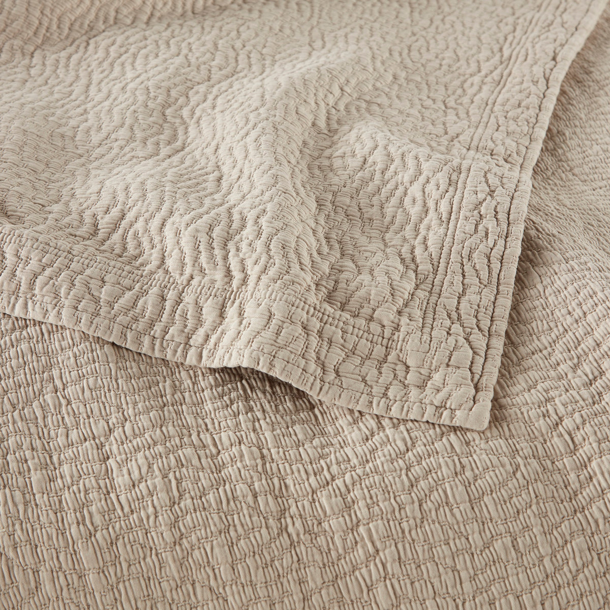Detail Shot of Peacock Alley Mia Stonewashed Matelassé Bedding in Color Dune