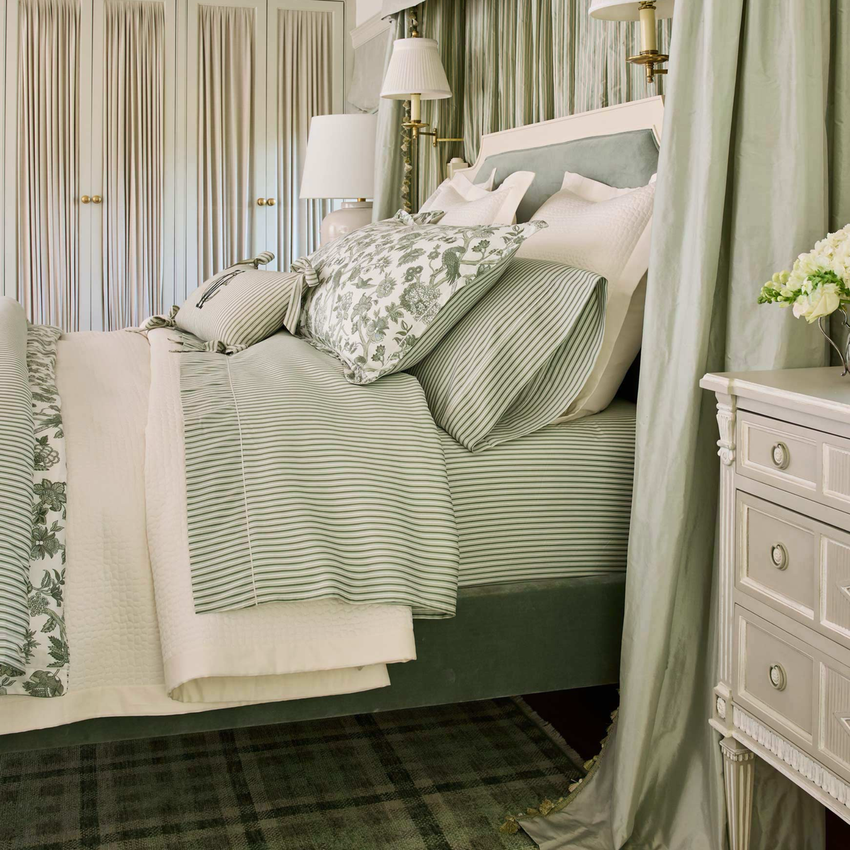 Sideview of Bed with Peacock Alley Moss Coordinate in a green room