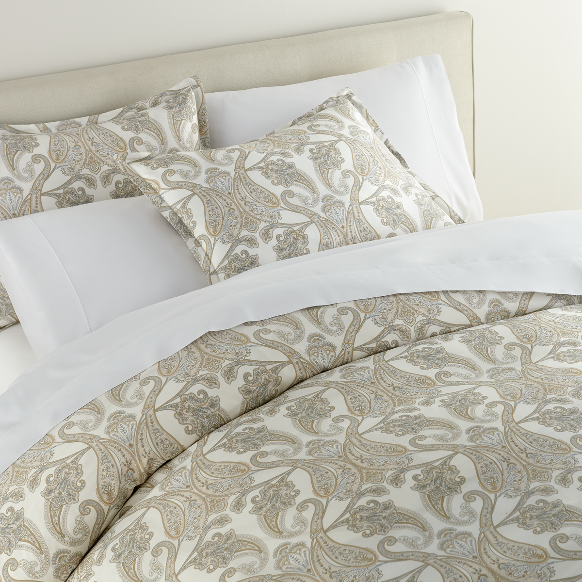 Closeup of Peacock Alley Paisley Duvet Cover and Shams in Pearl
