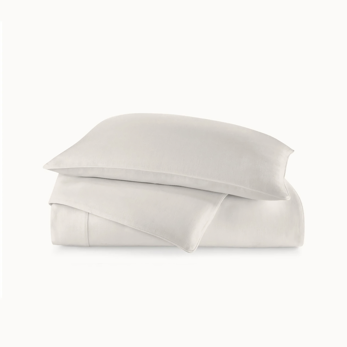 Stack of Peacock Alley Rio Corded Duvet Cover and Sham in Platinum