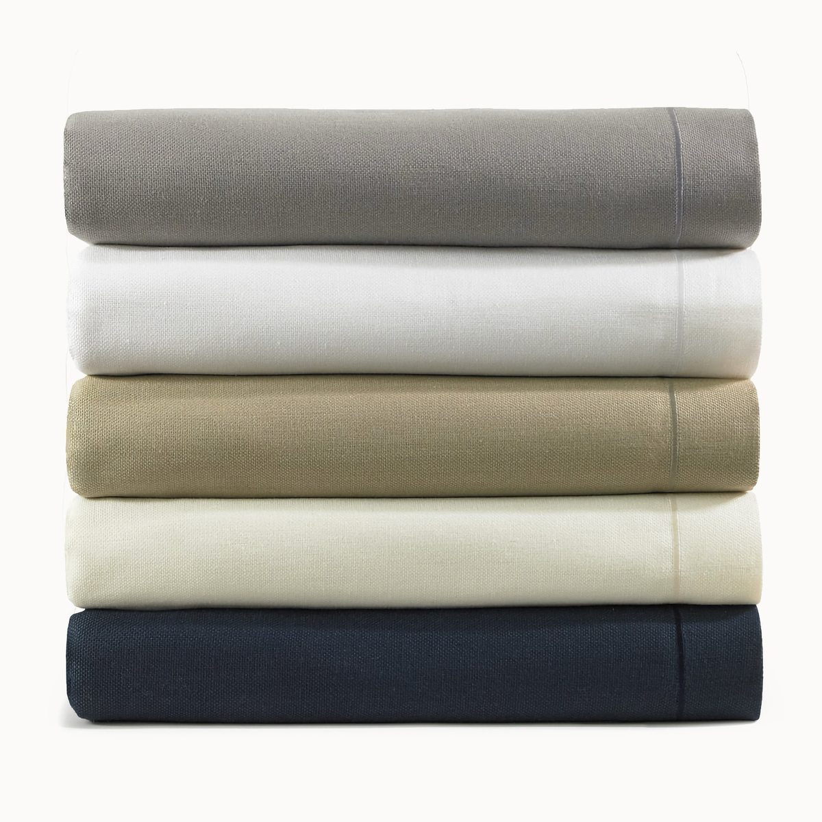 Stack of Folded Peacock Alley Rio Corded Bedding