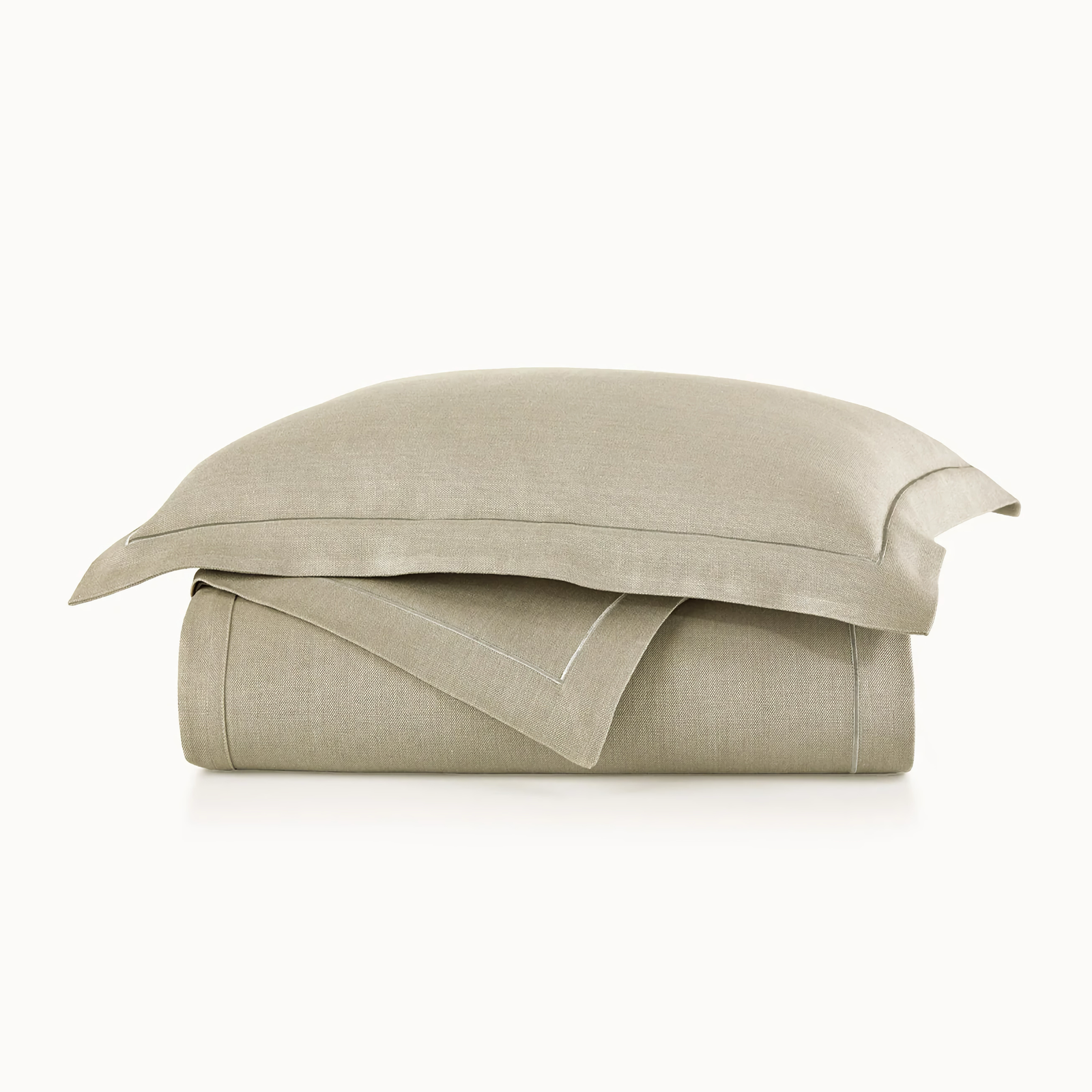 Stack of Peacock Alley Rio Satin Stitch Bedding in Linen