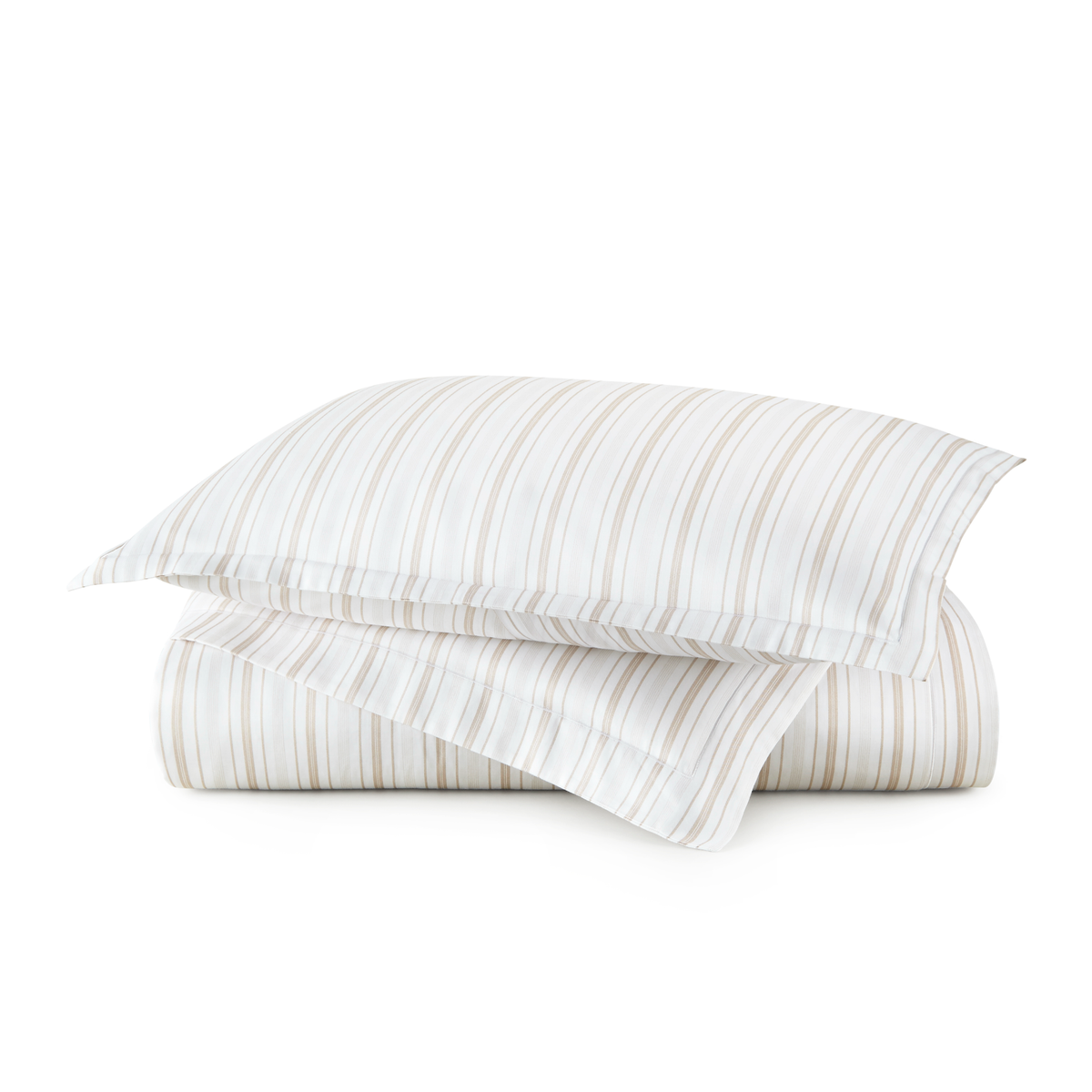 Stack of Peacock Alley Shelby Duvet Covers and Shams in Linen