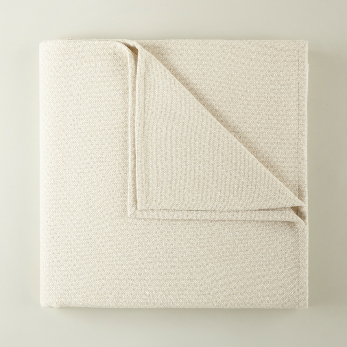 Folded of Peacock Alley Vineyard Throw in Linen