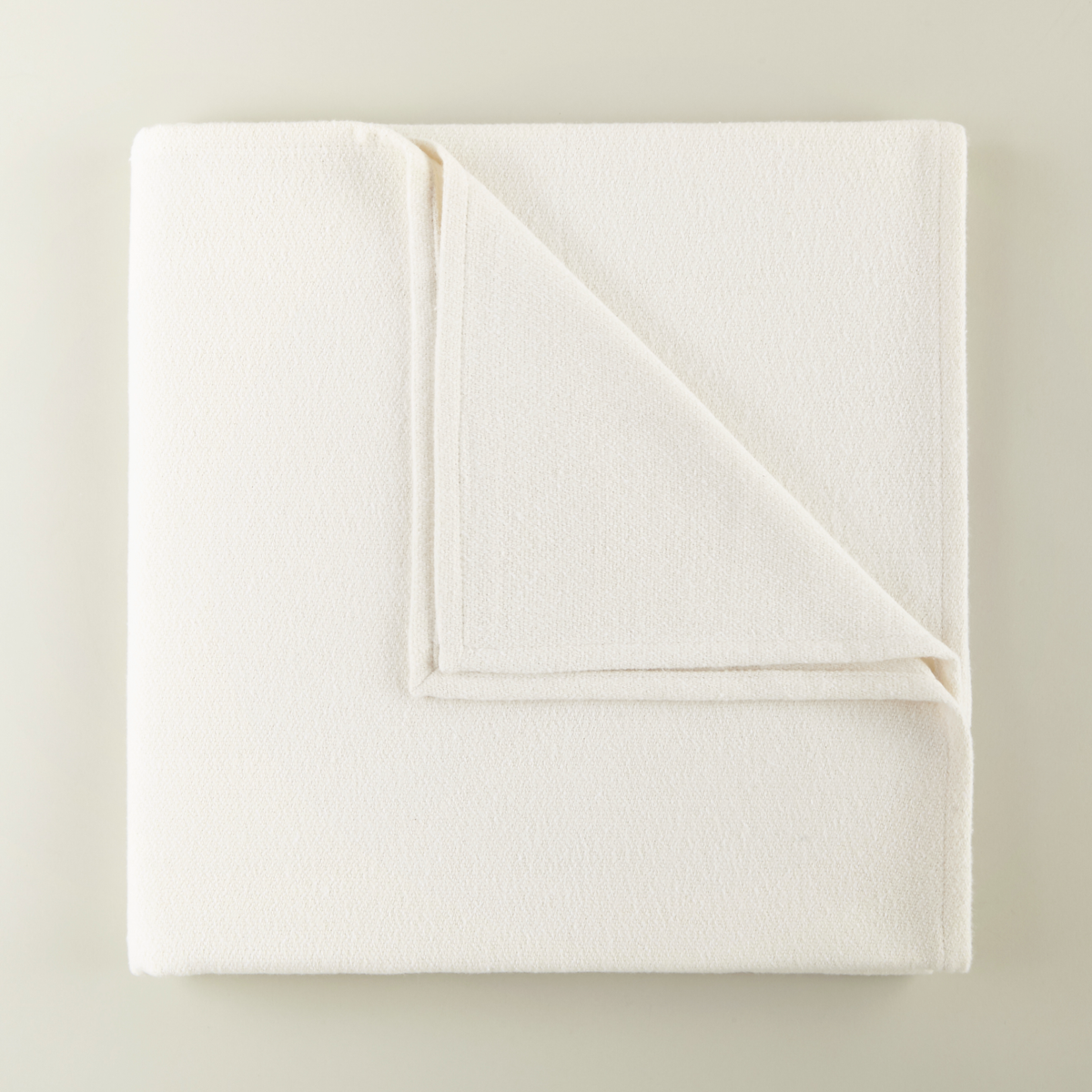 Folded of Peacock Alley Vineyard Throw in Pearl