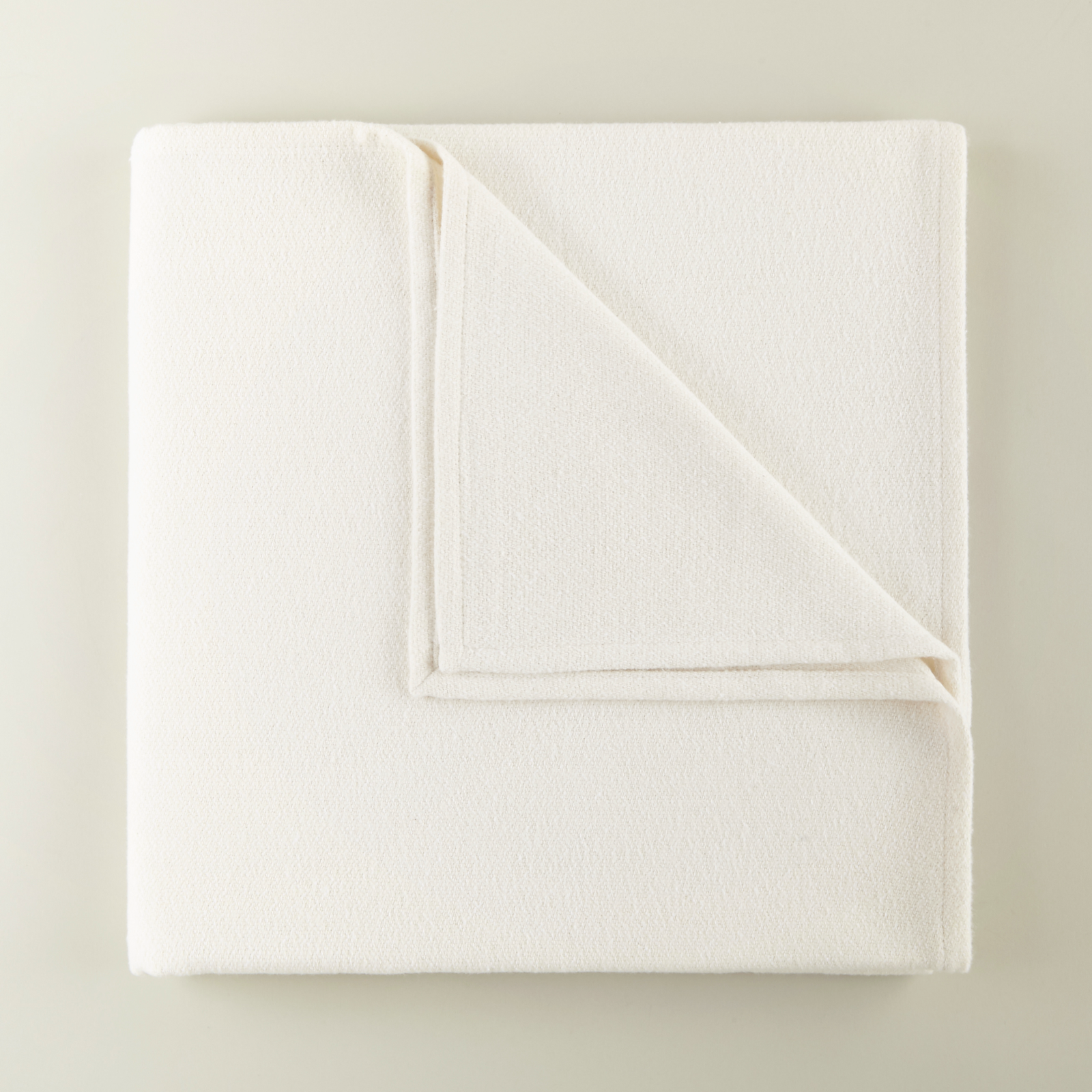 Folded of Peacock Alley Vineyard Throw in Pearl